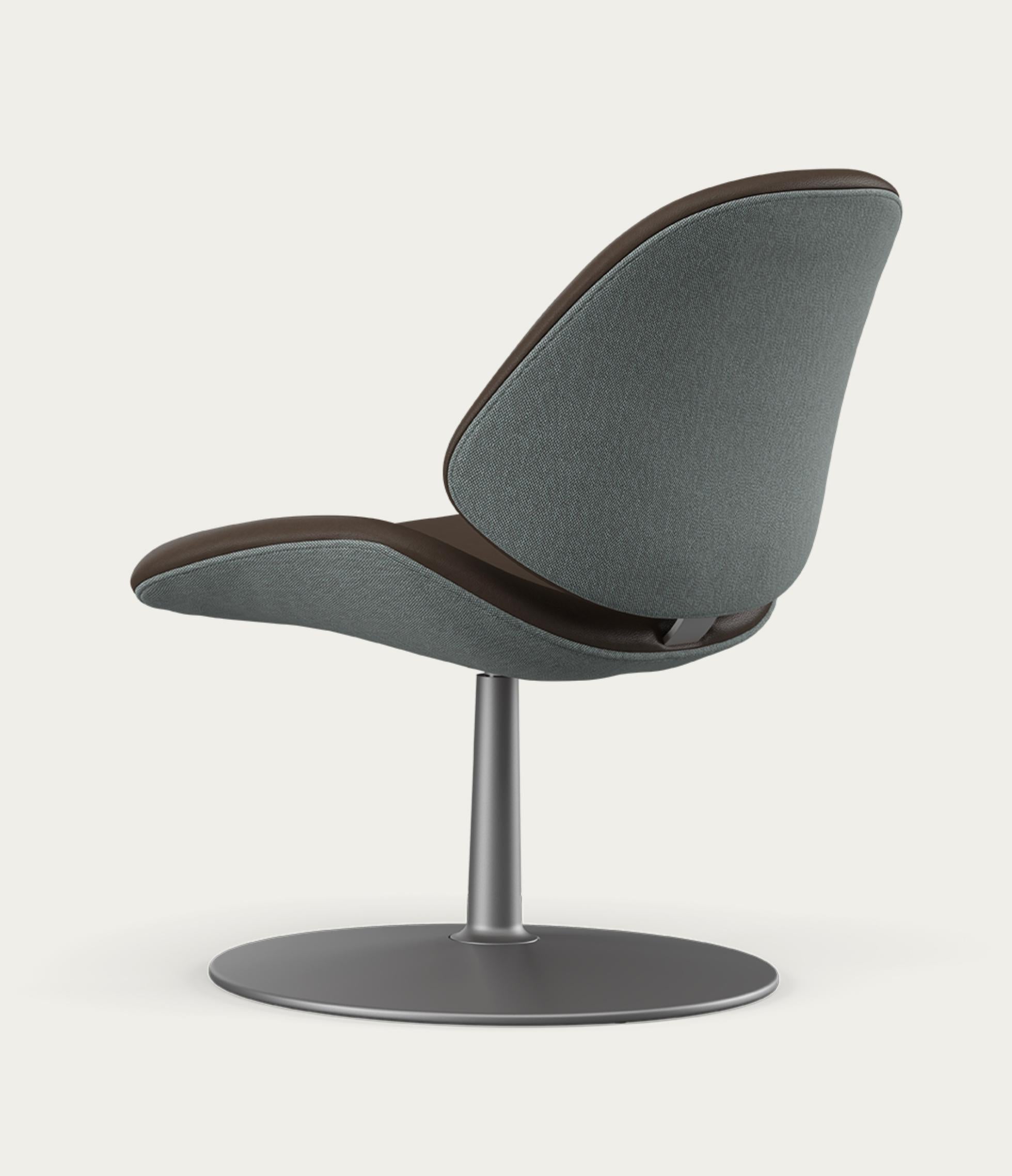 Salto and Sigsgaard Council Family Lounge Chair Legs: Graphite, Duo Upholstery: Front: Prestige Coffee + Back: Steelcut Quartet 144
 For One Collection 

Like the other chairs in the Council Family Series, the lounge version is designed with a