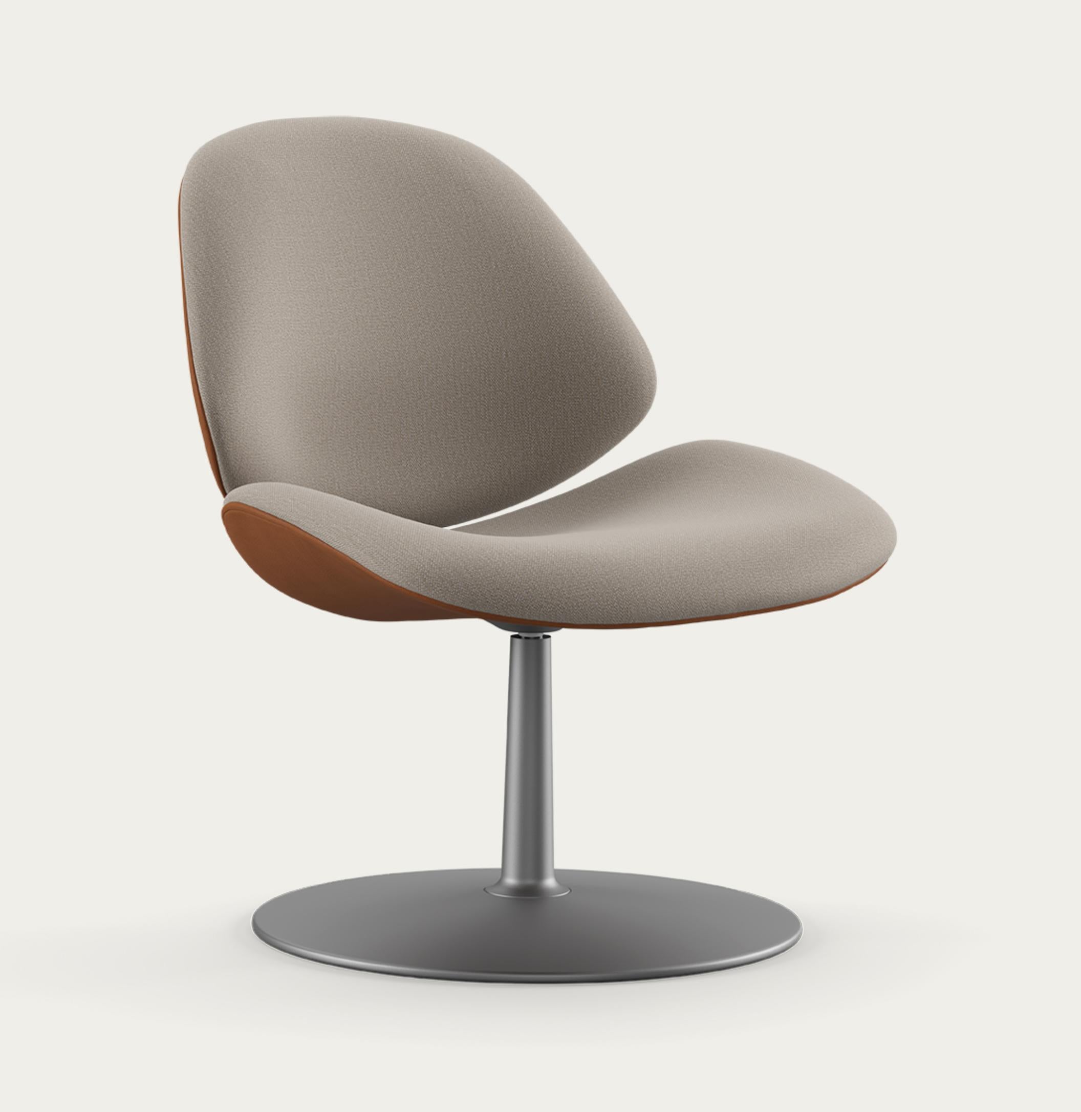 Salto and Sigsgaard Council Family Lounge Chair Legs: Graphite , Duo Upholstery: Front: Steelcut Quartet 224 + Back: Prestige Cognac
 For One Collection 

Like the other chairs in the Council Family Series, the lounge version is designed with a
