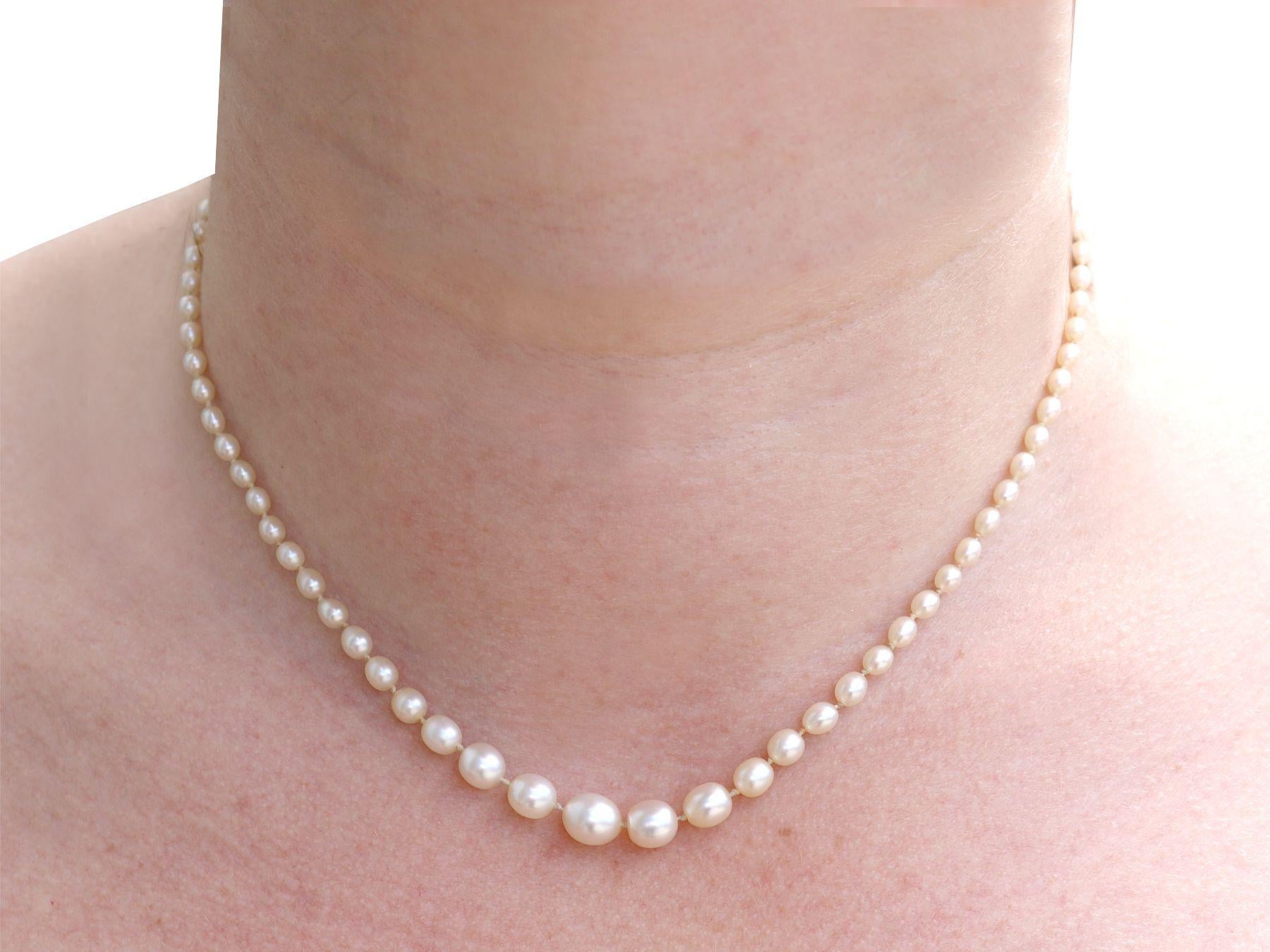 Saltwater Natural Pearl Necklace Diamond and Yellow Gold Clasp For Sale 3