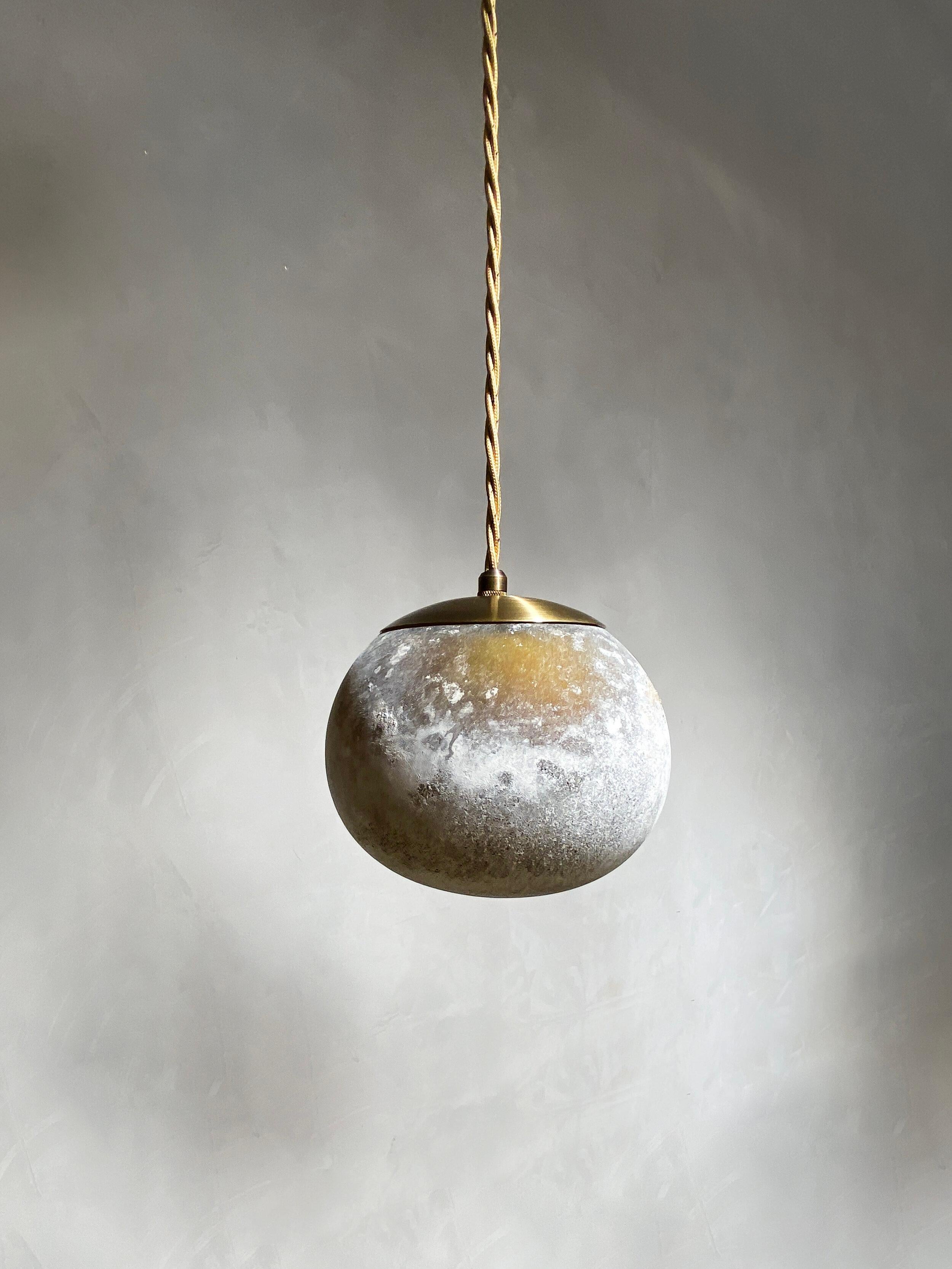Salty Pendant Ball 14 by Contain
Dimensions: D 14 x H 100cm (custom length).
Materials: Blown glass from local production with salty process.
Available in different finishes and dimensions (14 cm Ø / 18 cm Ø / 20 cm Øx (custom length)).

All our