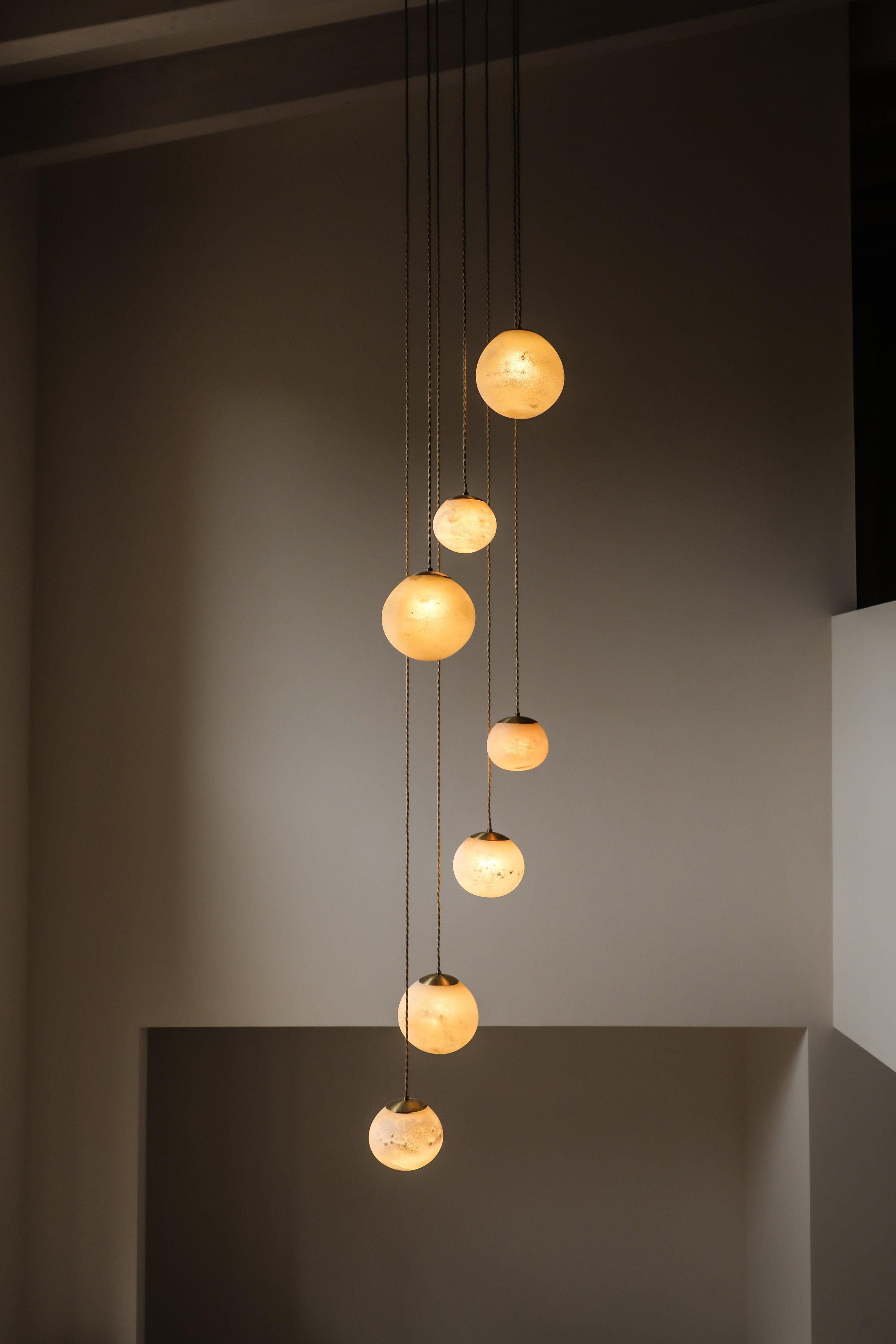 Salty Chandelier by Contain
Dimensions: Ø 18 x H 100 cm (custom length).
Materials: Blown glass from local production with salty process and brass structure.

Available in different finishes. Lenght is customizable. Please contact us.

All our