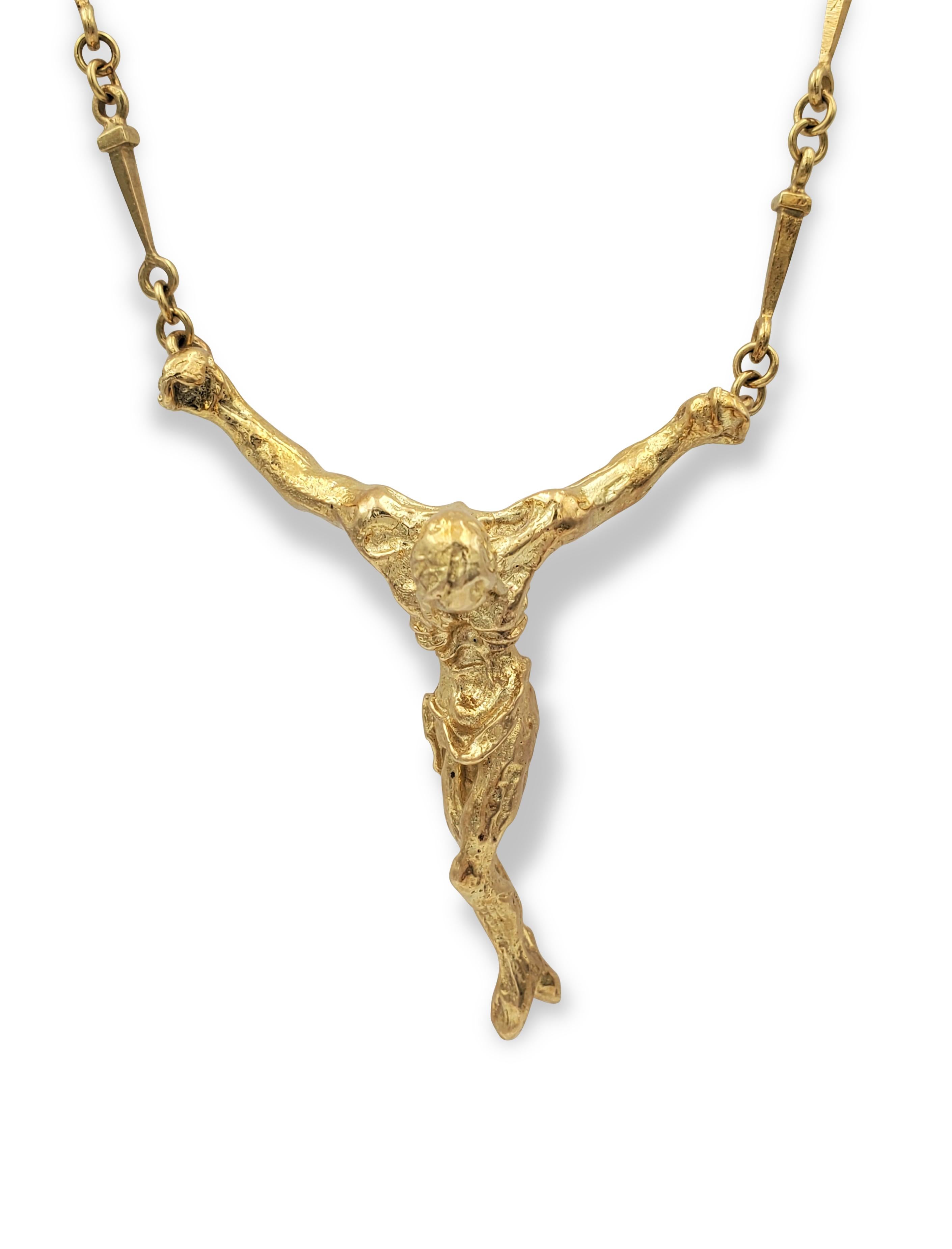 Limited Edition Salvador Dali Large Cristo De San Juan De La Cruz convertible necklace and bracelet set crafted in 18 karat yellow gold. Numbered 758 out of 1000 made. Signed Dali, A-758. Necklace measures 25 inches (or 17 inches if wearing