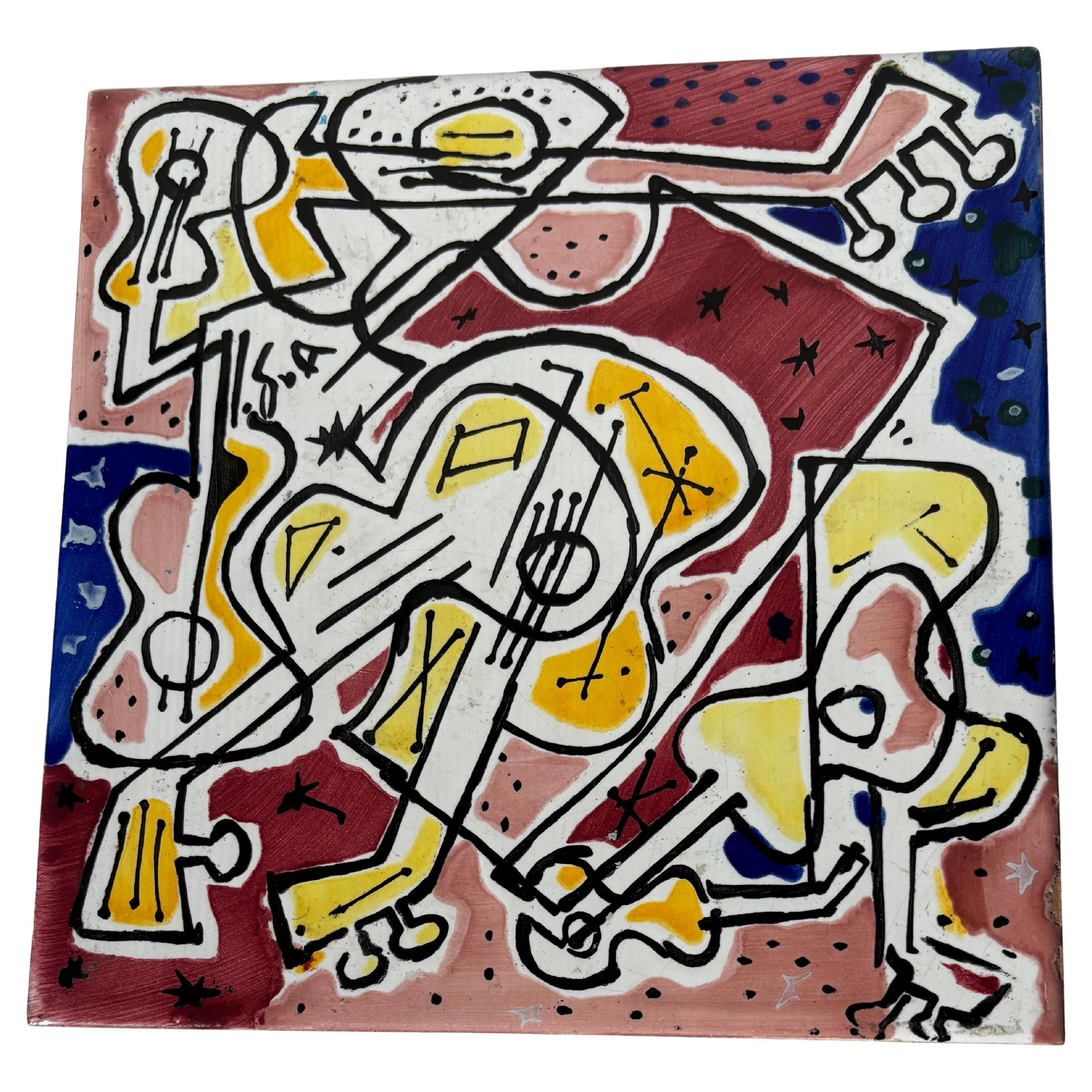 Salvador Dali design ceramic / pottery tile , JS Edition ."Les Guitares"
