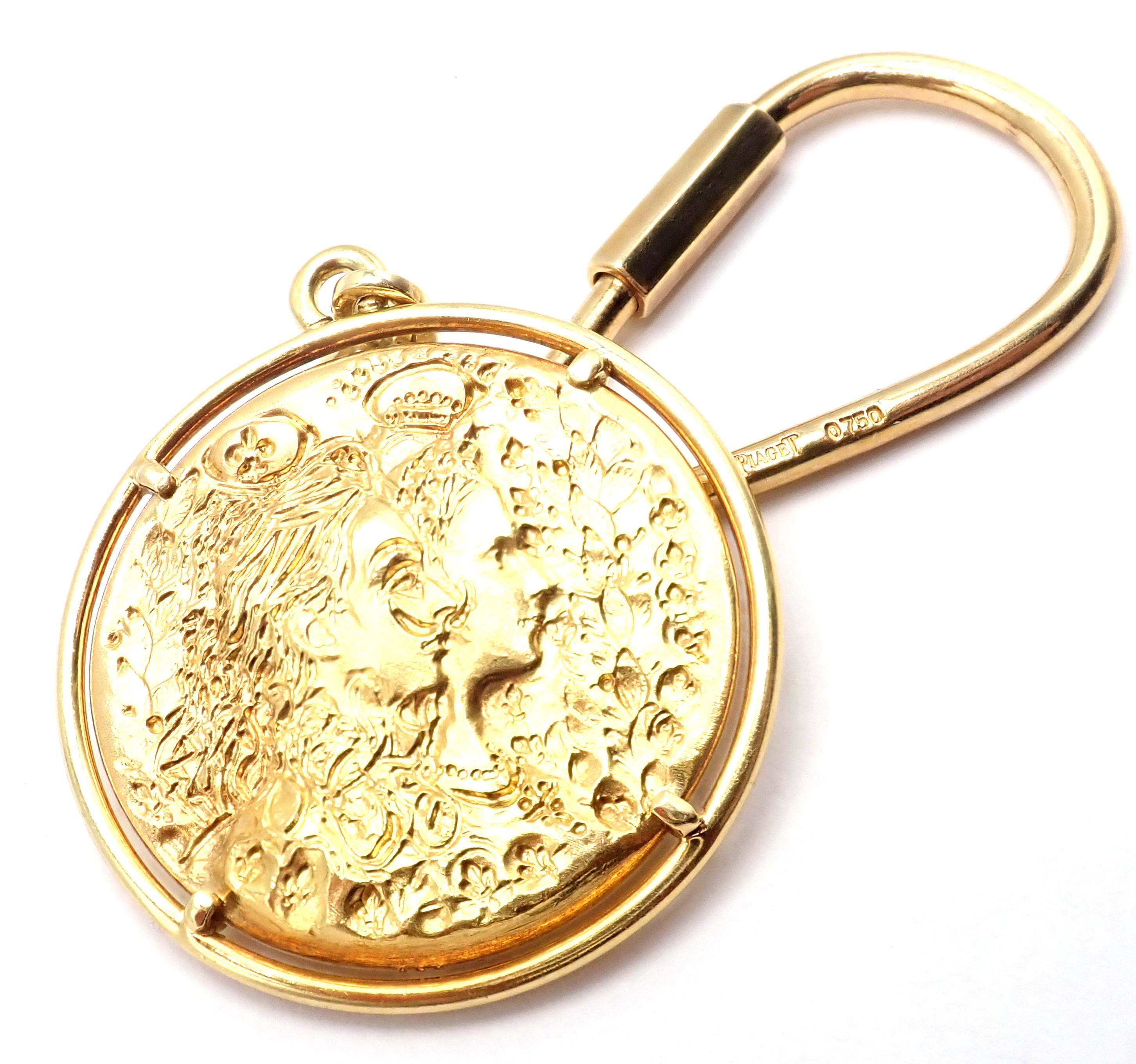 22k Yellow Gold Coin & 18k Yellow Gold Key Chain by Salvador Dali D'or for Piaget. 
An extremely rare 22k yellow gold coin key chain designed by the famous surrealist painter Salvador Dali. 
Inspired by his hero, Louis XIV, Dali minted a limited