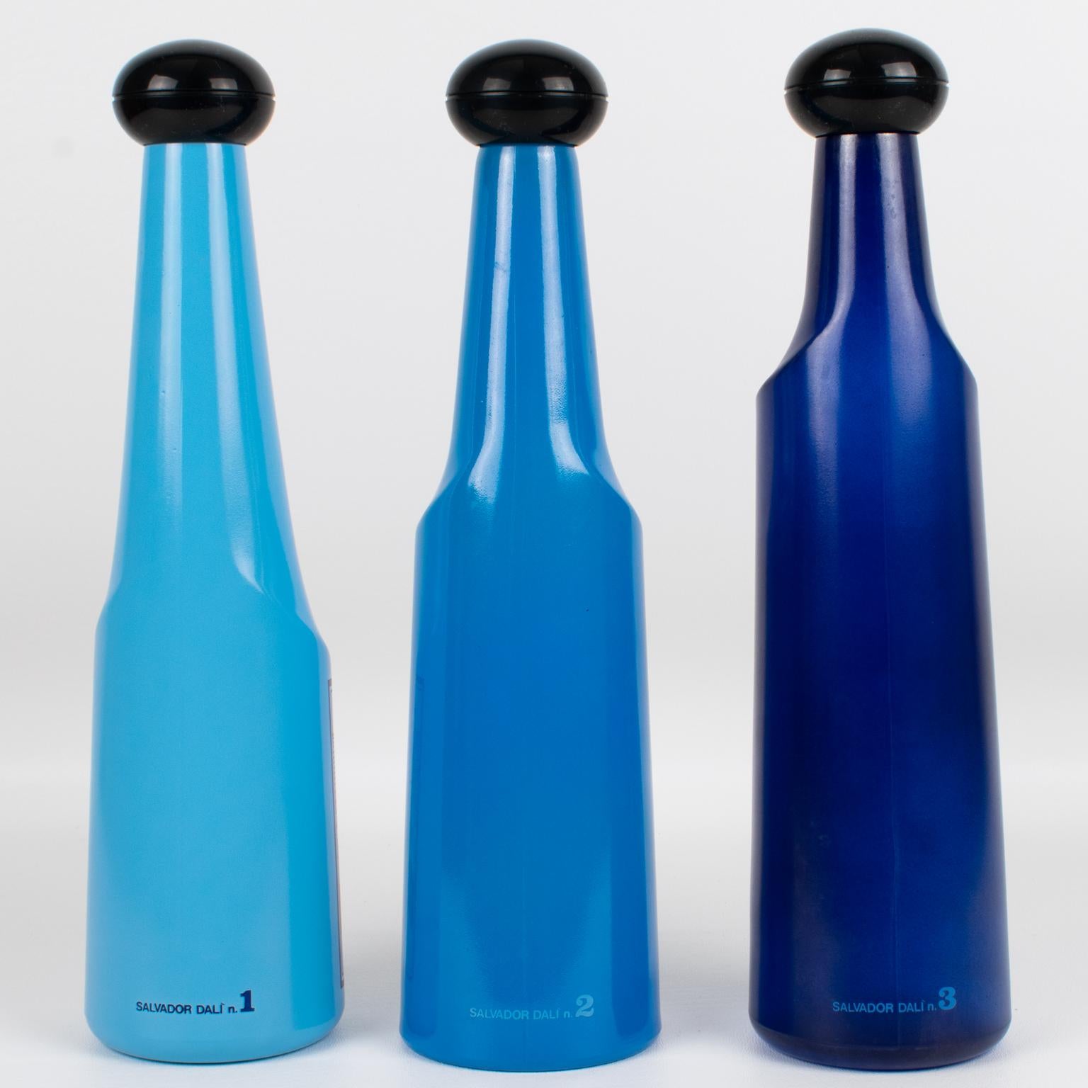 Salvador Dali for Rosso Antico, Blue Glass Bar Bottles, a trio, circa 1970 In Excellent Condition For Sale In Atlanta, GA