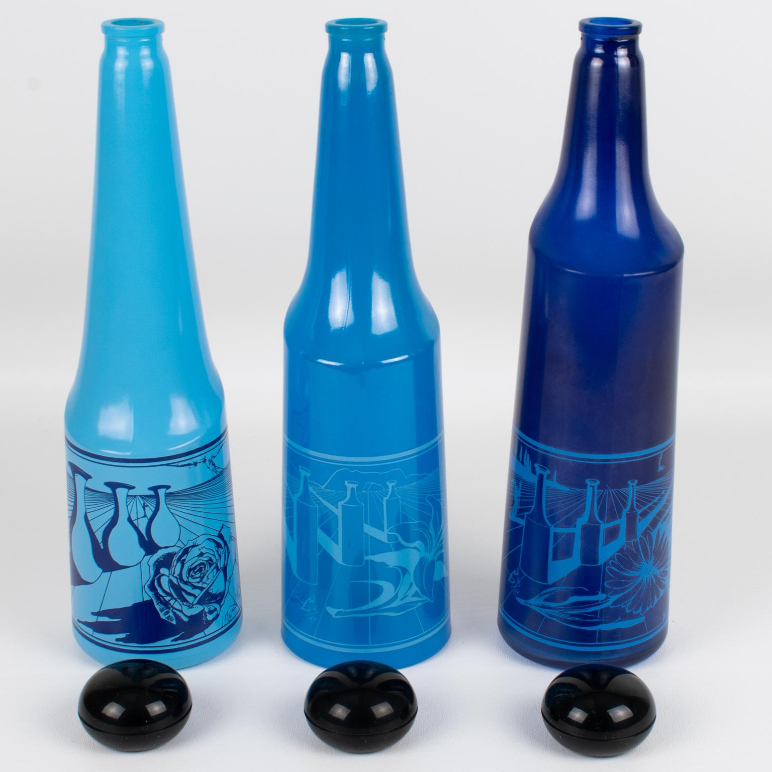 Opaline Glass Salvador Dali for Rosso Antico, Blue Glass Bar Bottles, a trio, circa 1970 For Sale