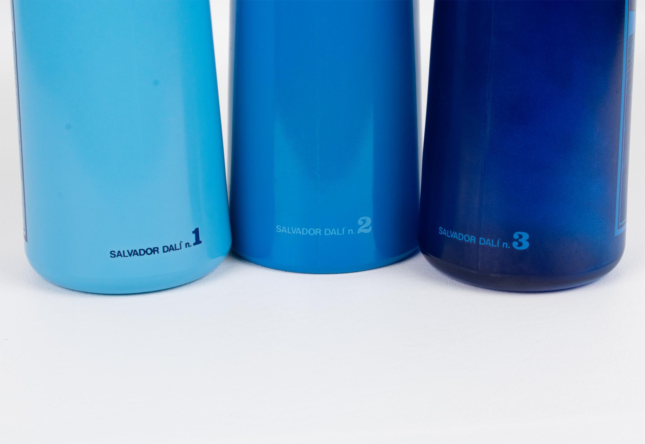 Salvador Dali for Rosso Antico, Blue Glass Bar Bottles, a trio, circa 1970 For Sale 2