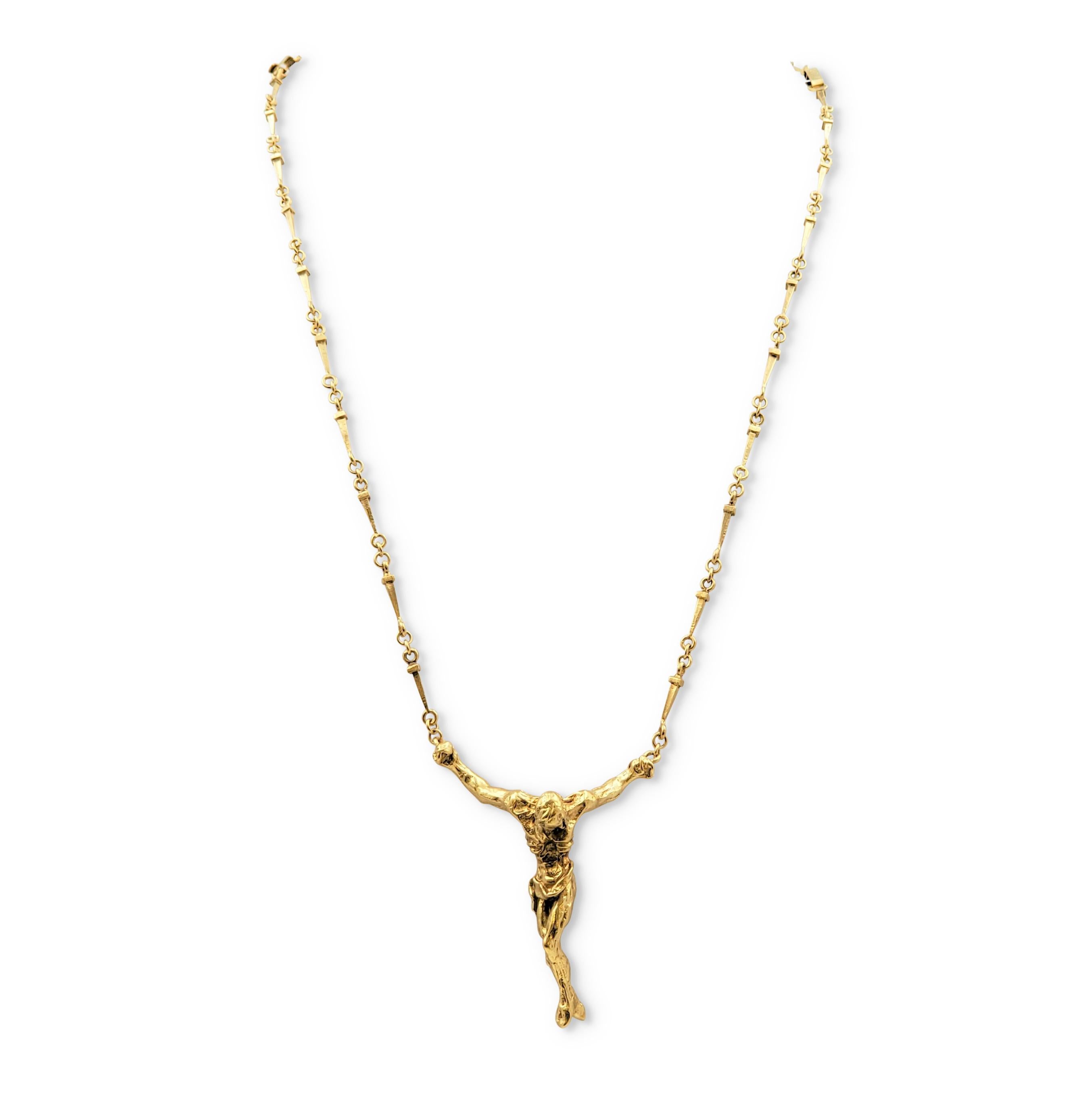 Limited Edition Salvador Dali Large Christ Saint John On The Cross convertible necklace and bracelet set crafted in 18 karat yellow gold. Numbered 896 out of 1,000 made. Signed Dali, A-896. Necklace measures 25 inches (or 17 inches if wearing the