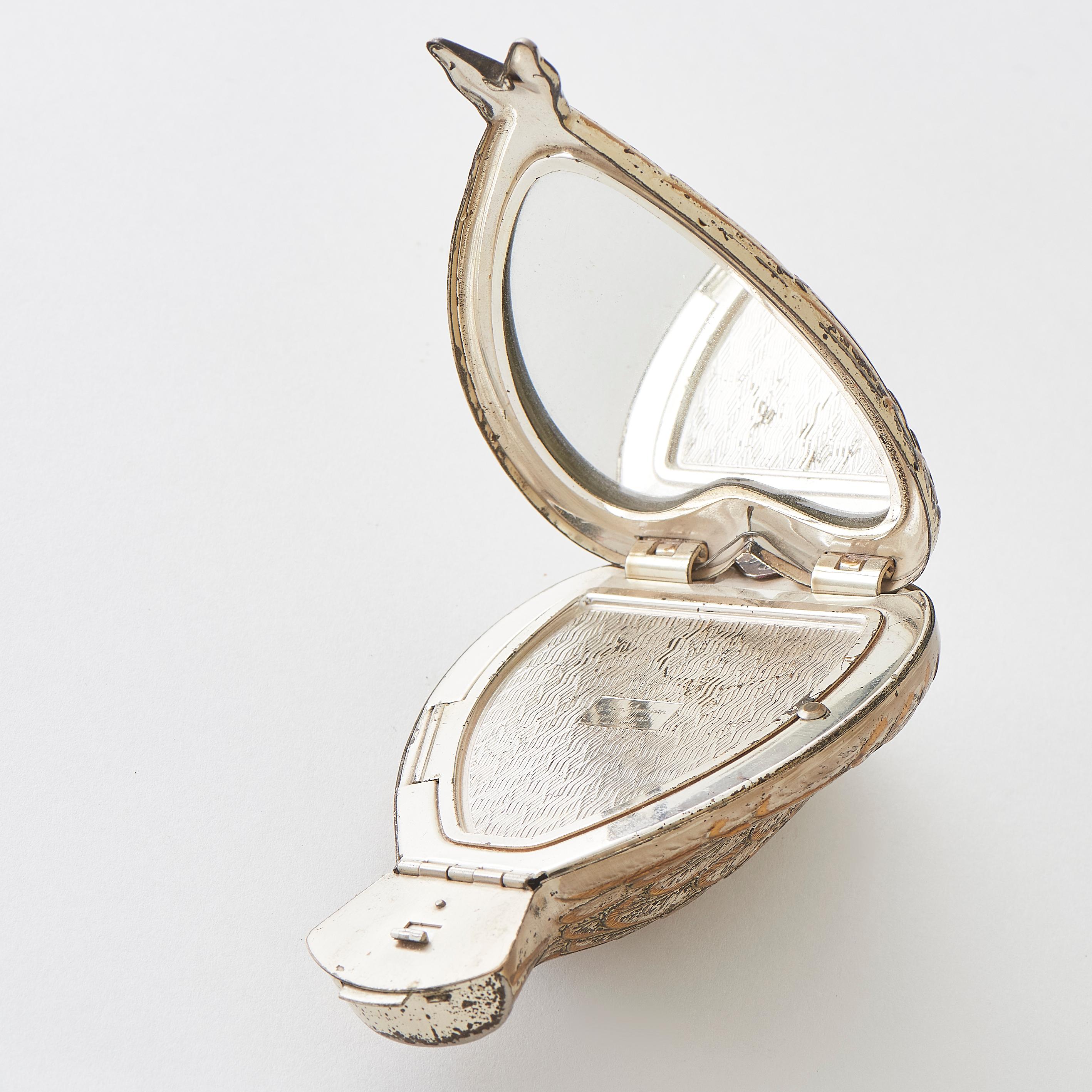 Salvador Dalí Compacto de metal y dorado 