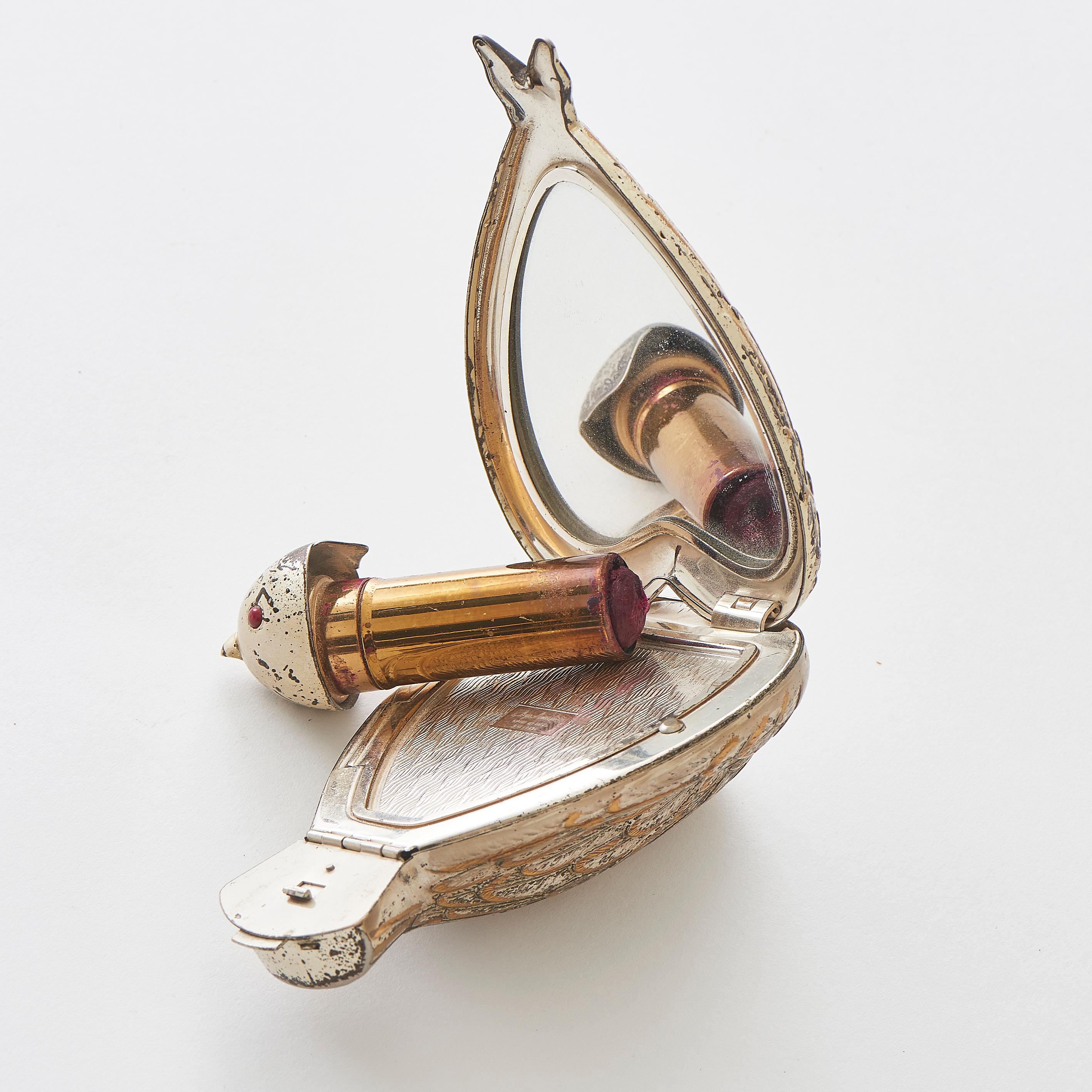 Salvador Dalí Compacto de metal y dorado 