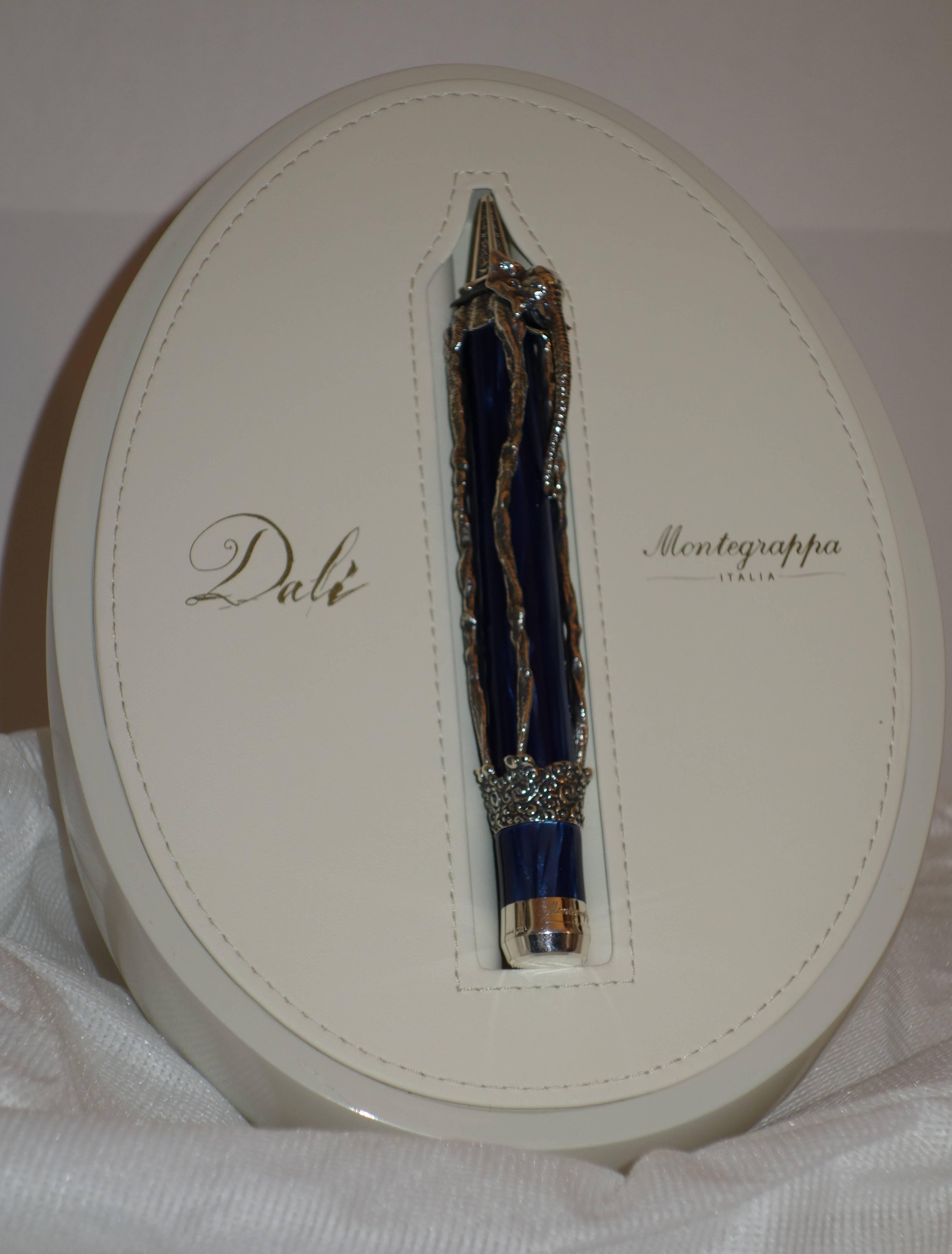 Salvador DALI
Cosmic Elephant

Limited edition Fountain Pen (Size of the nib : M)
With sterling silver sculpture by Dali
Also made from precious blue resin
Engraved signtaure of Dali
Limited edition numbered / 1000 copies
With certificate of