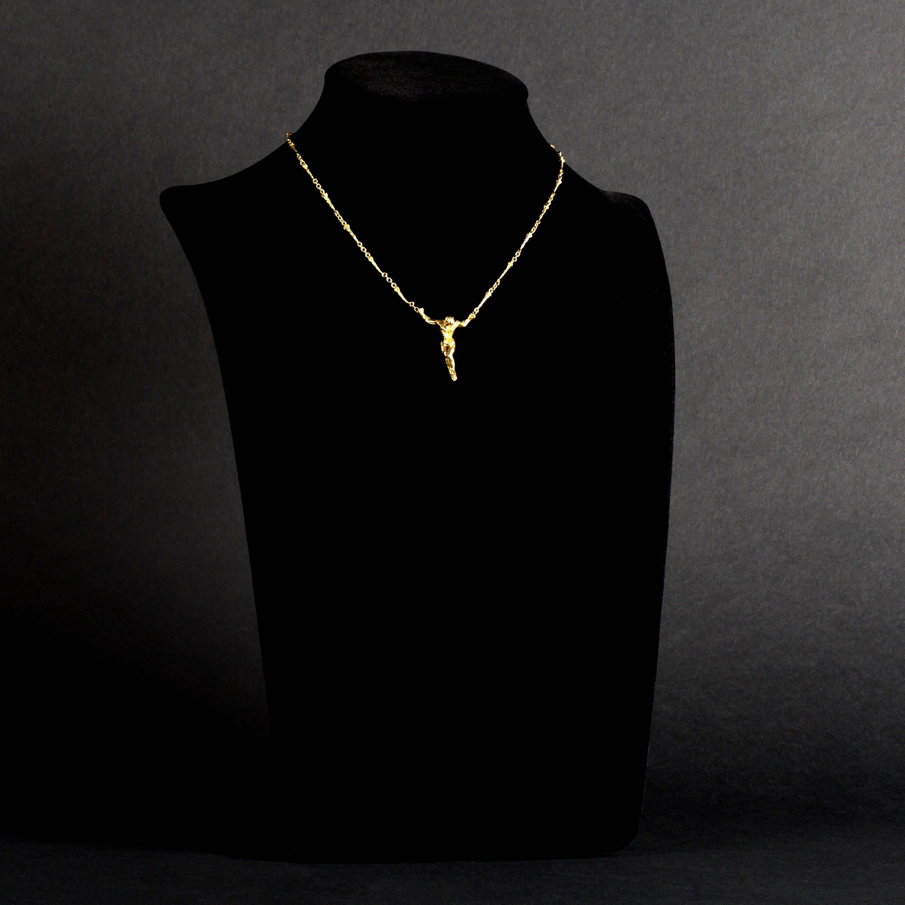 Salvador Dali - Christ - Signed Gold Necklace
18k yellow-gold original Necklace - signed - edition of 1000 
1970 
This exclusive necklace is a creation by the hands of famous artist Salvador Dali. The necklace is a symbol from one of his paintings.