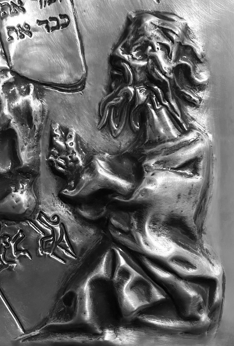 ARTIST: Salvador Dali

TITLE: The 10 Commandments Platinum Bas Relief

MEDIUM: Bas Relief 

SIGNED: Not hand signed.  The Bas Relief bears the artist signature toward the left side as it appears in the original wax.

EDITION NUMBER: 
