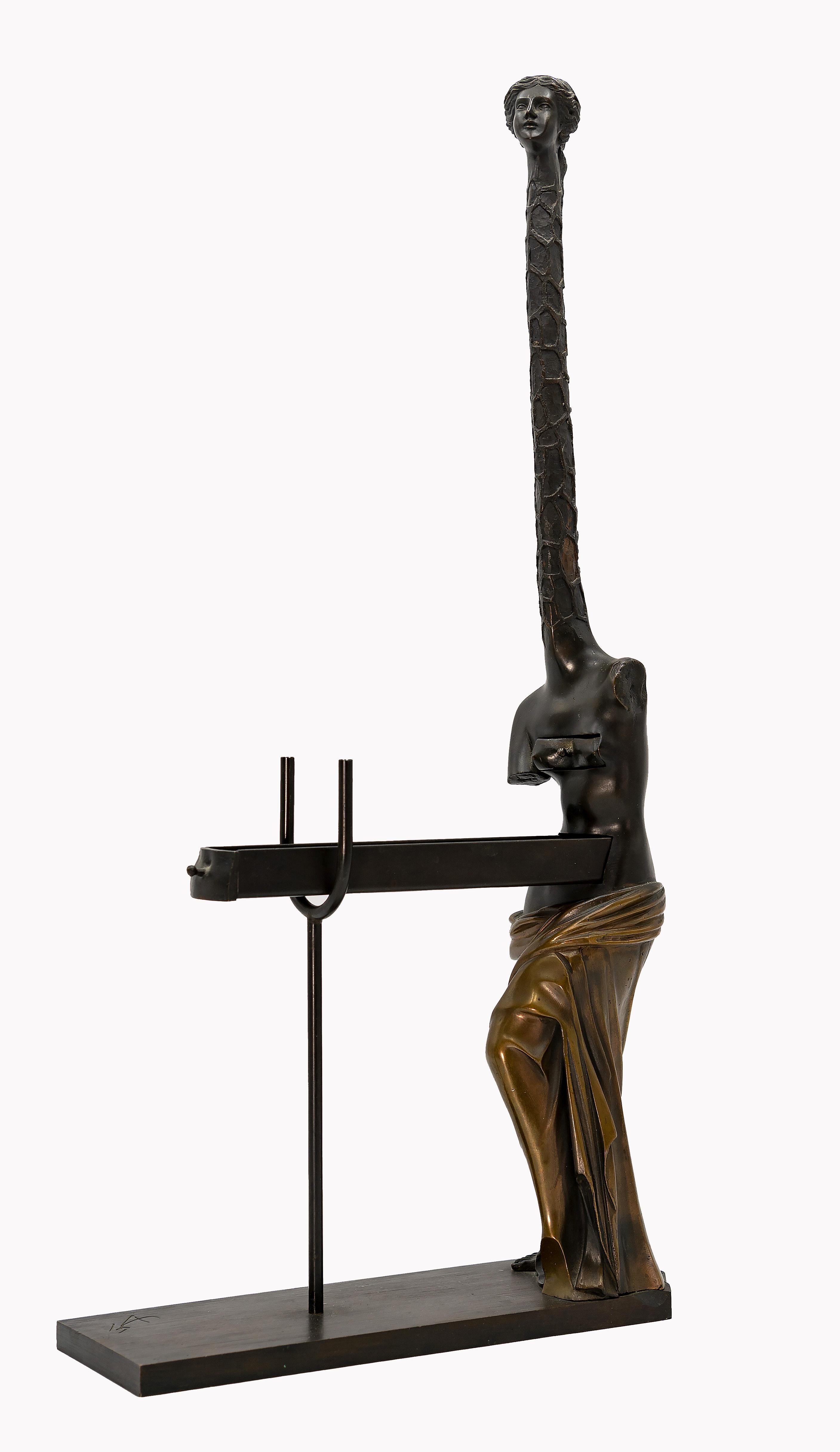 Venus à la girafe is an original contemporary artwork realized by Salvador Dalì in 1973.

Limited Edition of 1500 numbered pieces. Our specimen is the 1045/1500.

Bronze, patinated in brown and gold, on a bronze plate. 

Fusion by Venturi Arte