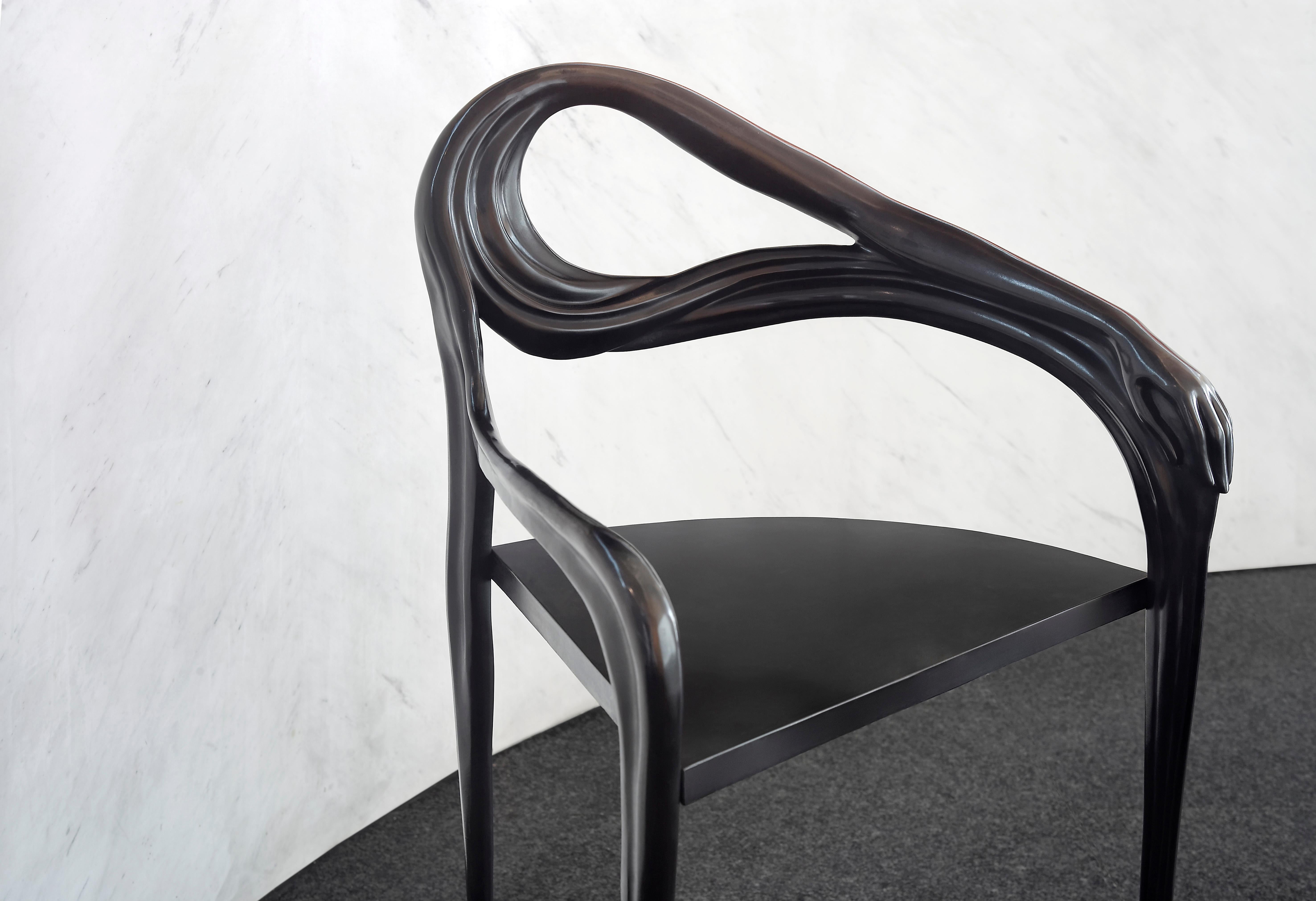 Leda armchair designed by Dali manufactured by BD.

All pieces of ironwork in this collection are made of brass. The Black Label Leda collection has an artisanal application of a special patina (metal dissolved in nitric acid) which is applied to