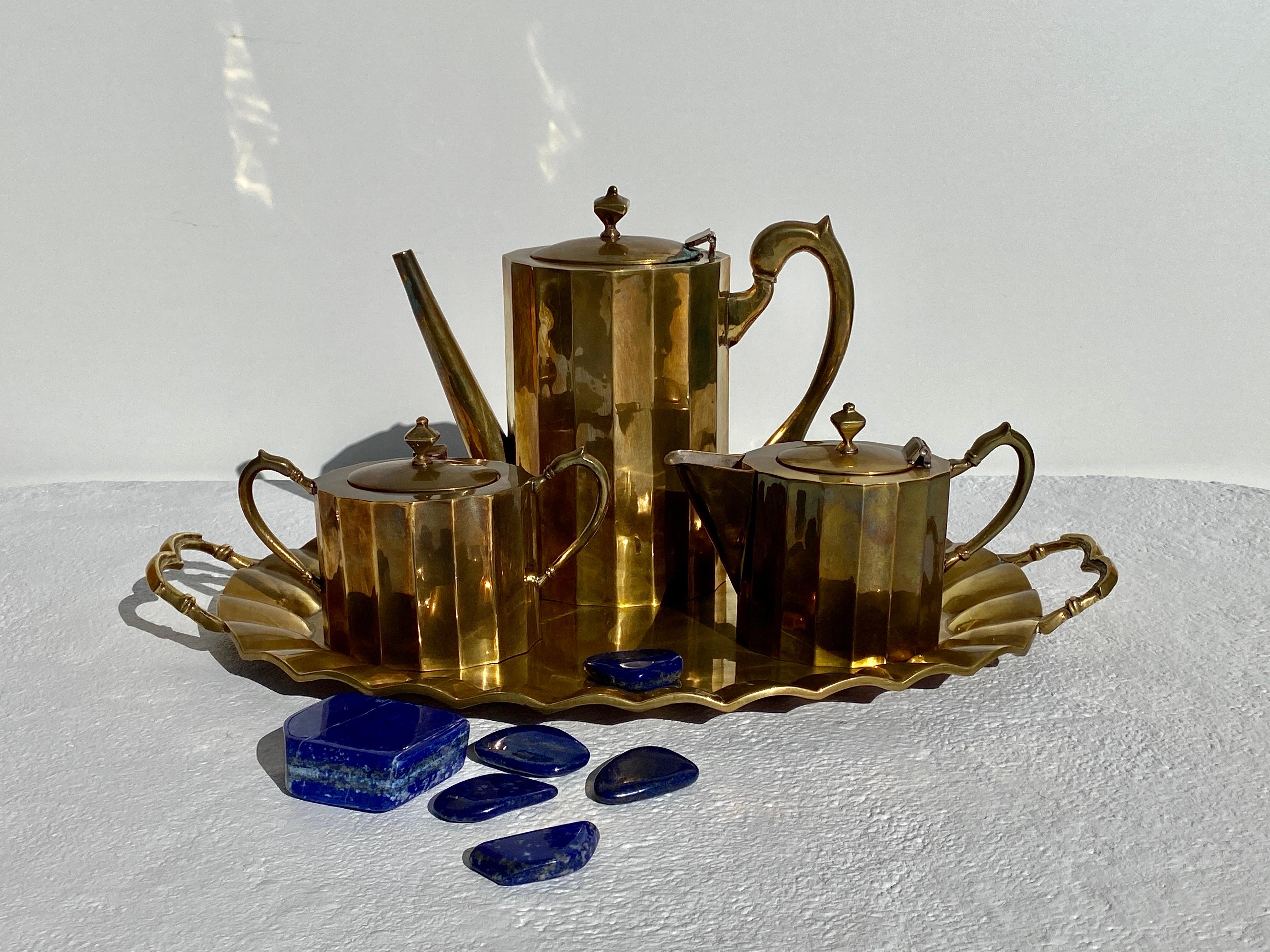 Brass tea serving set by Salvador Teran. 
Tray: 20