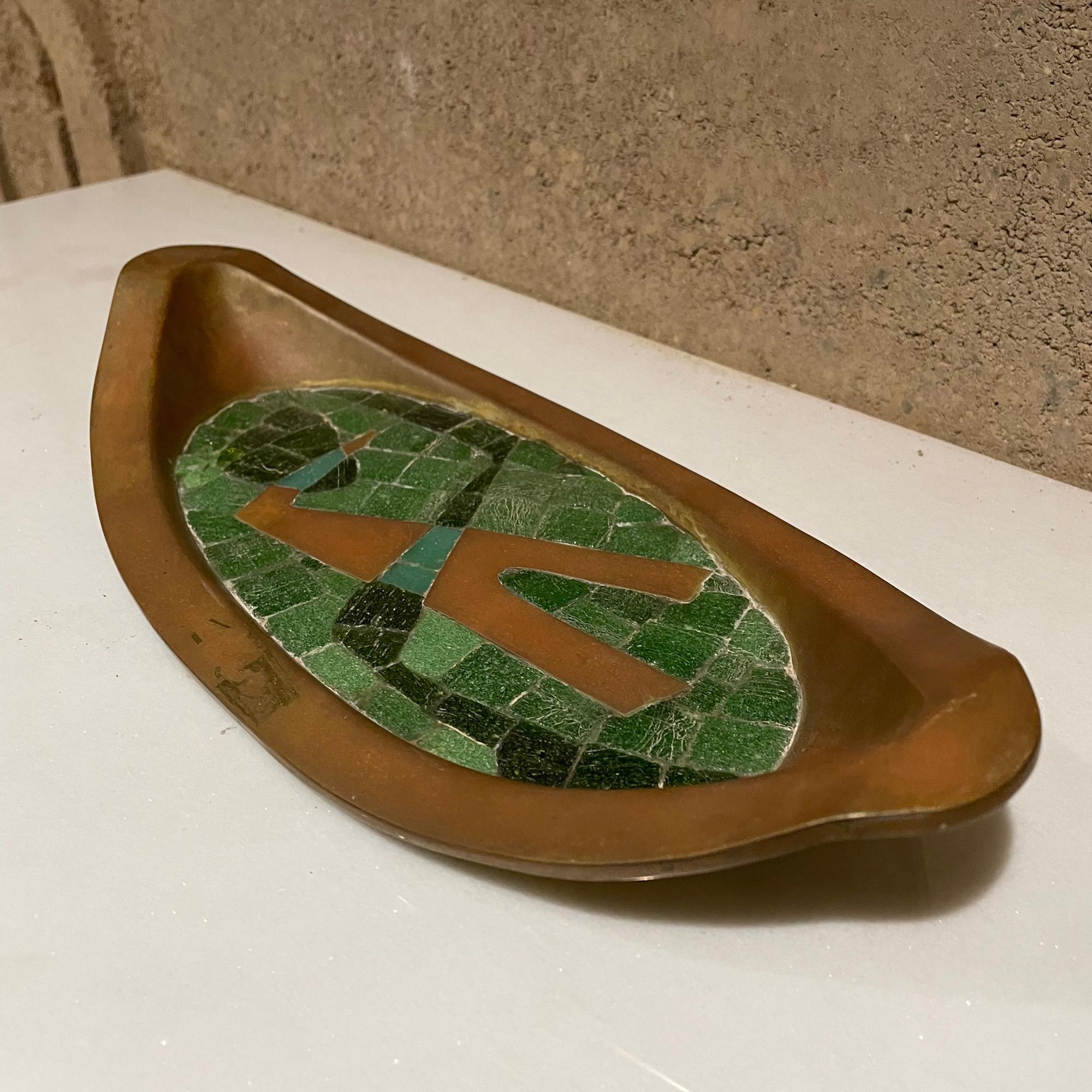Wall Art Tile Tray by Salvador Teran
Brass and Mosaic Jade Green Stone Decorative Tray - Handwrought Wall Art Plaque by Salvador Teran, Mexico 1960s.
Maker stamp present.
Dimensions: 12.75 L x 5.75W x 1.75 inches H
Preowned Original unrestored
