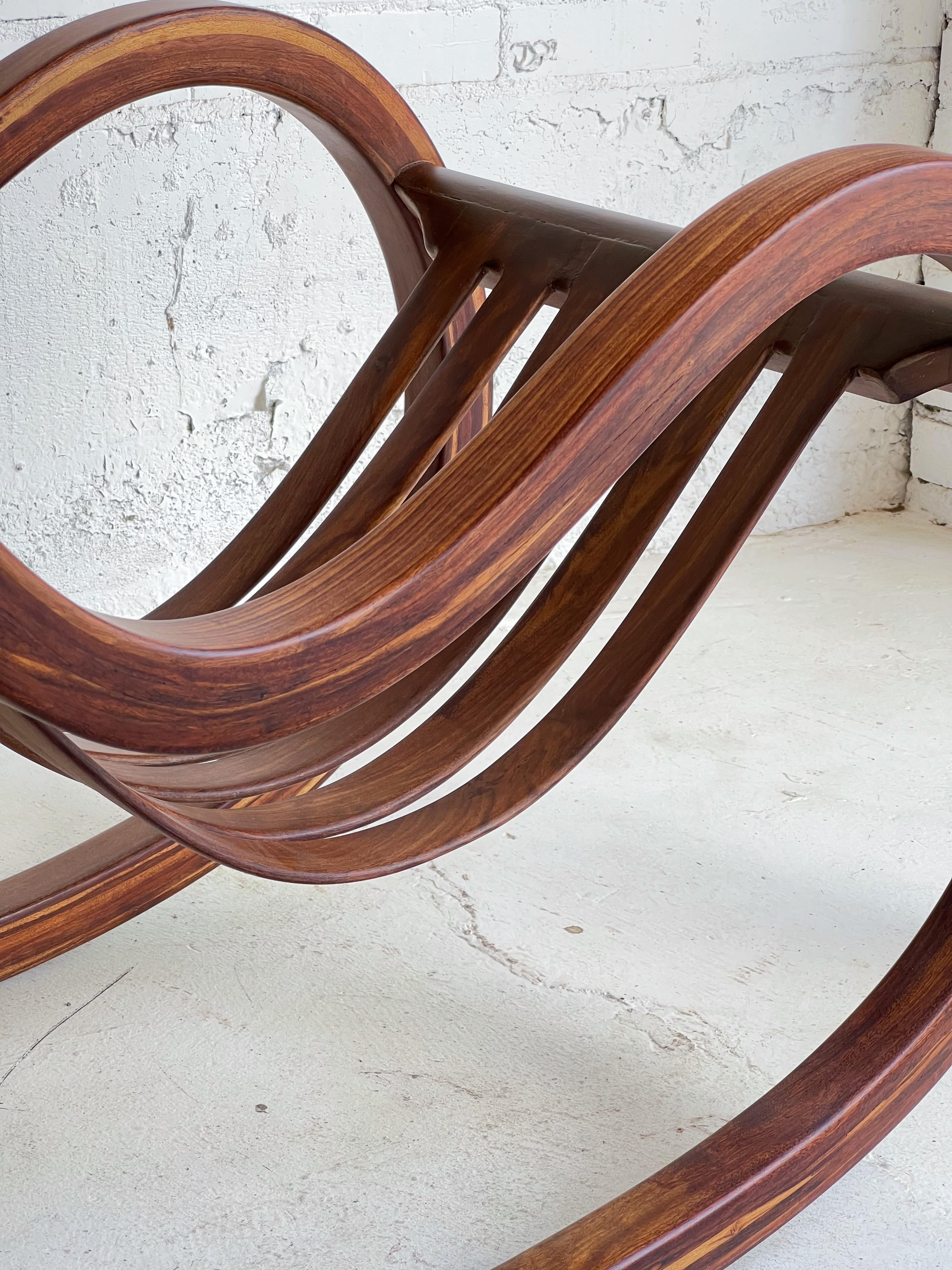 Salvador Vidal Vintage Cantilevered Rosewood Rocking Chair For Sale 5