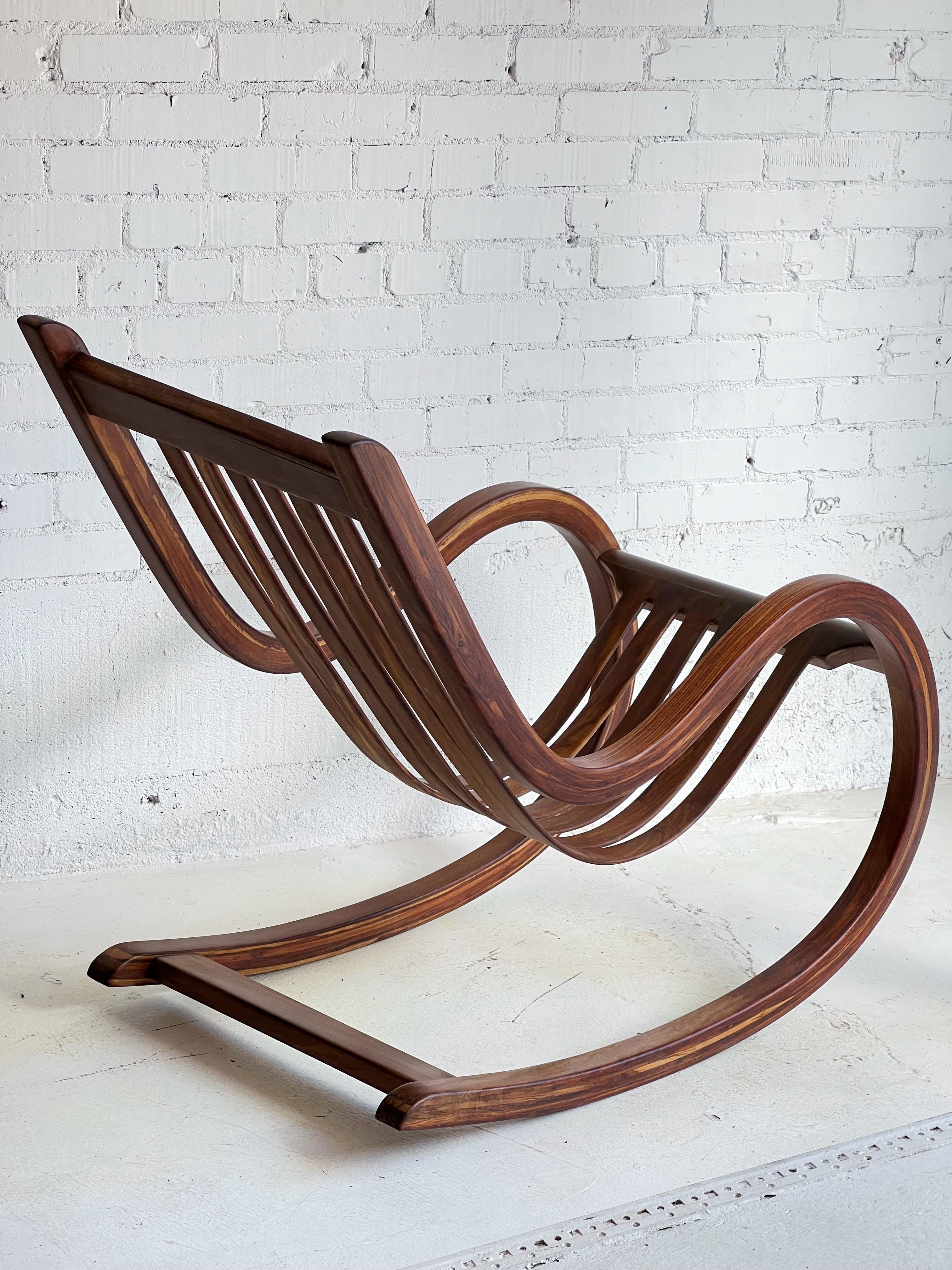 Che-Chent Rocking Chair designed by Salvador Vidal - Handmade in the designer's studio furniture maker in Cancun, Mexico. Made of Caribbean rosewood also known as Palo de Rosa tree, or Che-Chent to the locals, which was harvested in the jungle as a