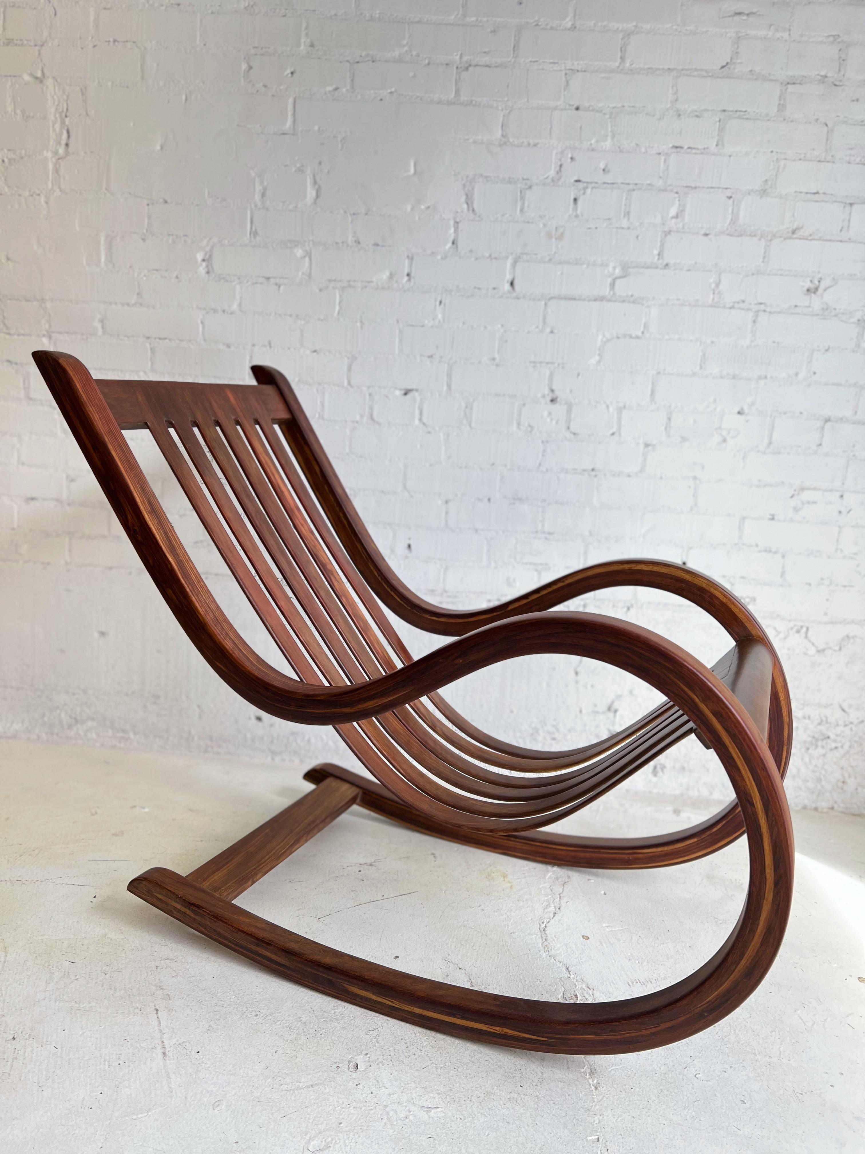 Late 20th Century Salvador Vidal Vintage Cantilevered Rosewood Rocking Chair For Sale