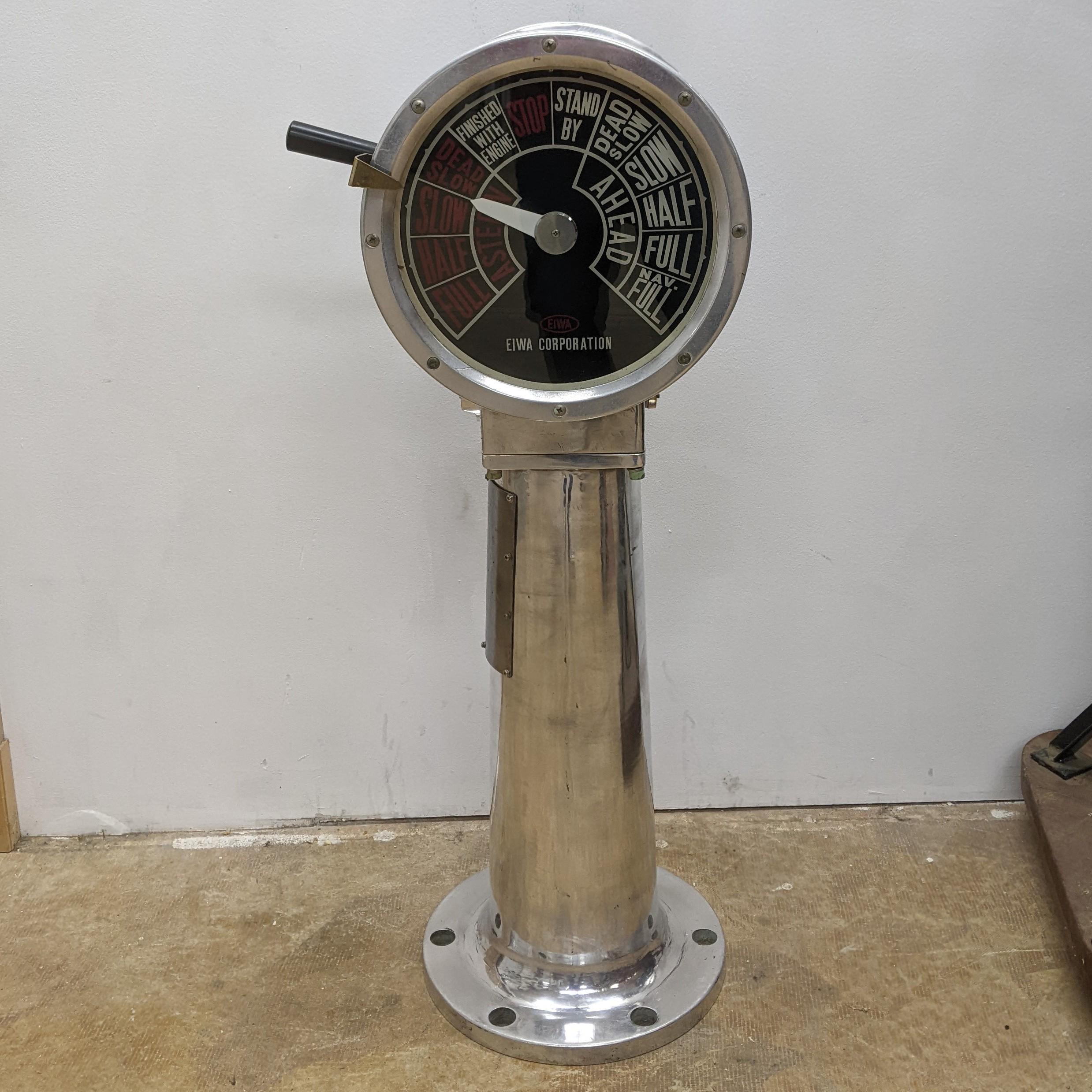 Experience the authenticity of maritime history with the EOT-19 Salvaged Aluminum EIWA Engine Order Telegraph. This rare and original piece was once used to transmit orders from the captain to the engine room on ships. Its rugged aluminum