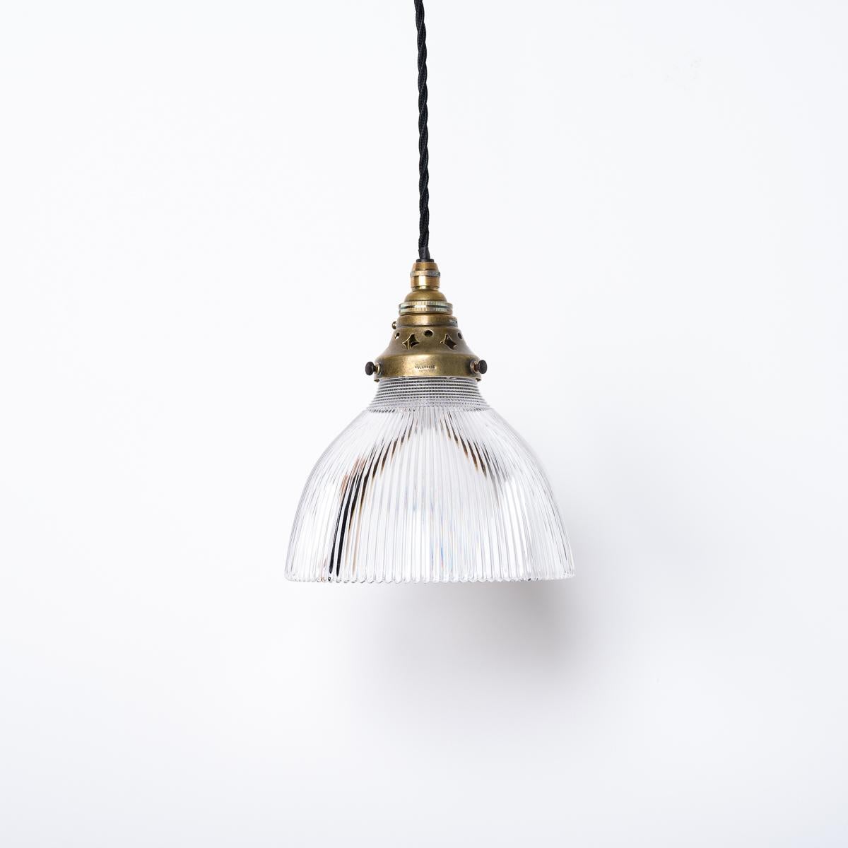 ANTIQUE HOLOPHANE  PRISMATIC GLASS PENDANT LIGHT


An attractive antique Holophane prismatic glass light with original adjustable aged brass fittings.

Stamped Holophane galleries and prismatic glass shades also bearing the Holophane makers marks