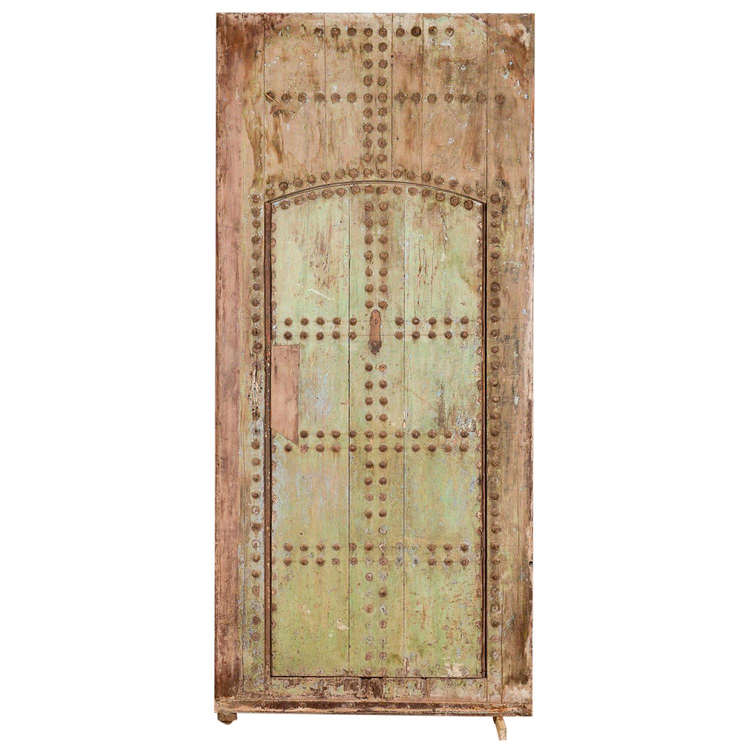 Salvaged Hardwood Studded Door in Frame, 20th Century For Sale