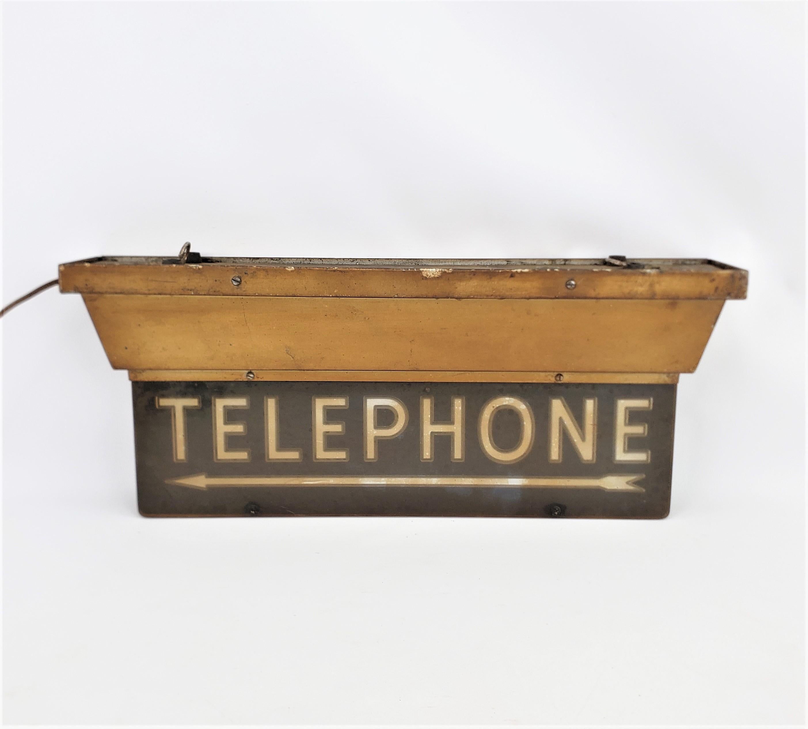 vintage lighted telephone sign