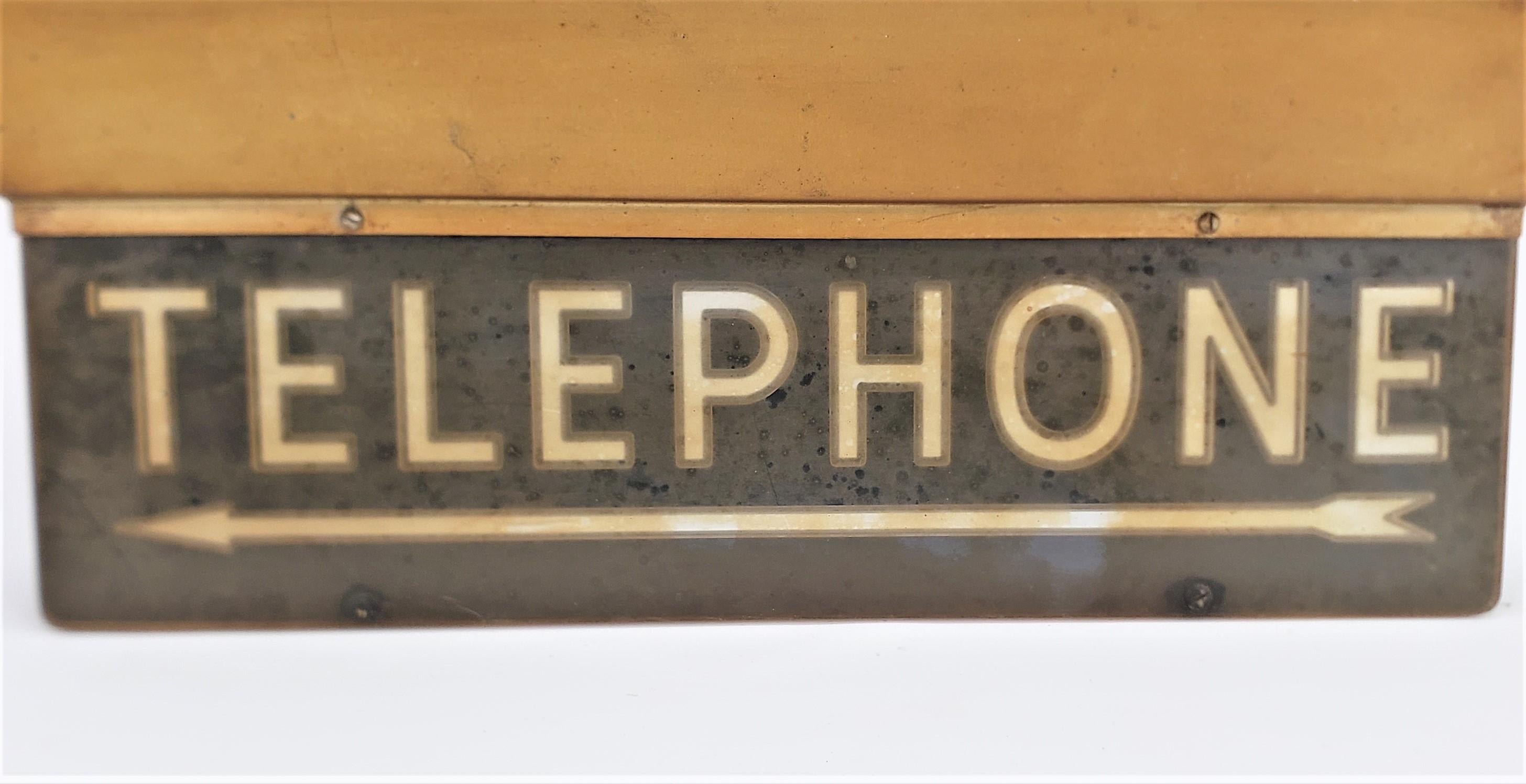 Salvaged Mid-Century Era Commercial Lighted Telephone Direction Sign & Bracket In Fair Condition In Hamilton, Ontario