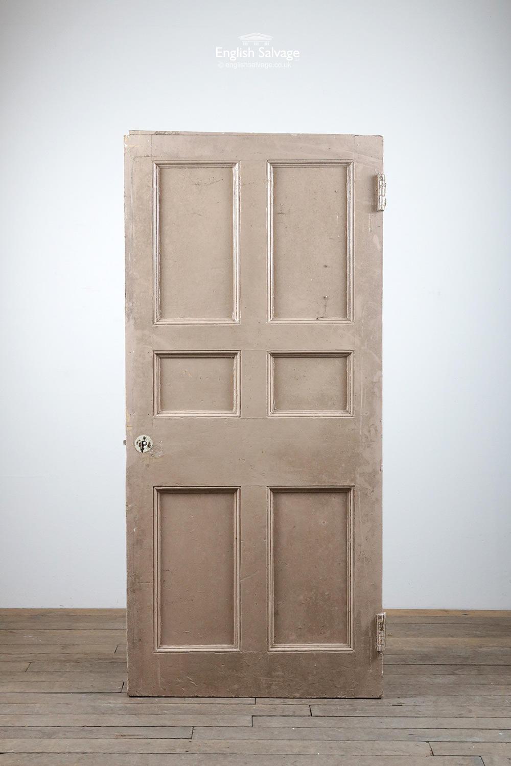 Unusual six paneled old pine door. Two large hinges, old fitting holes. Strip added to the top - height below excludes this.