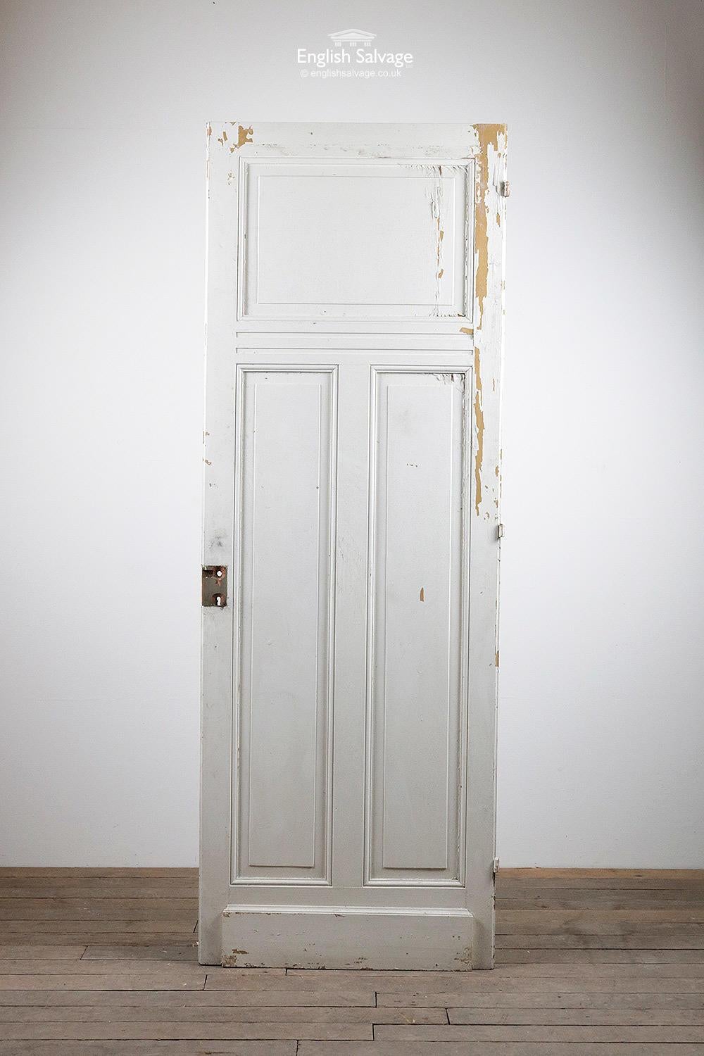 Tall pine one over two door. Painted white, this is flaking in places as shown. One of a set of doors reclaimed from the same property in France. Three old hinges and fitting holes present.