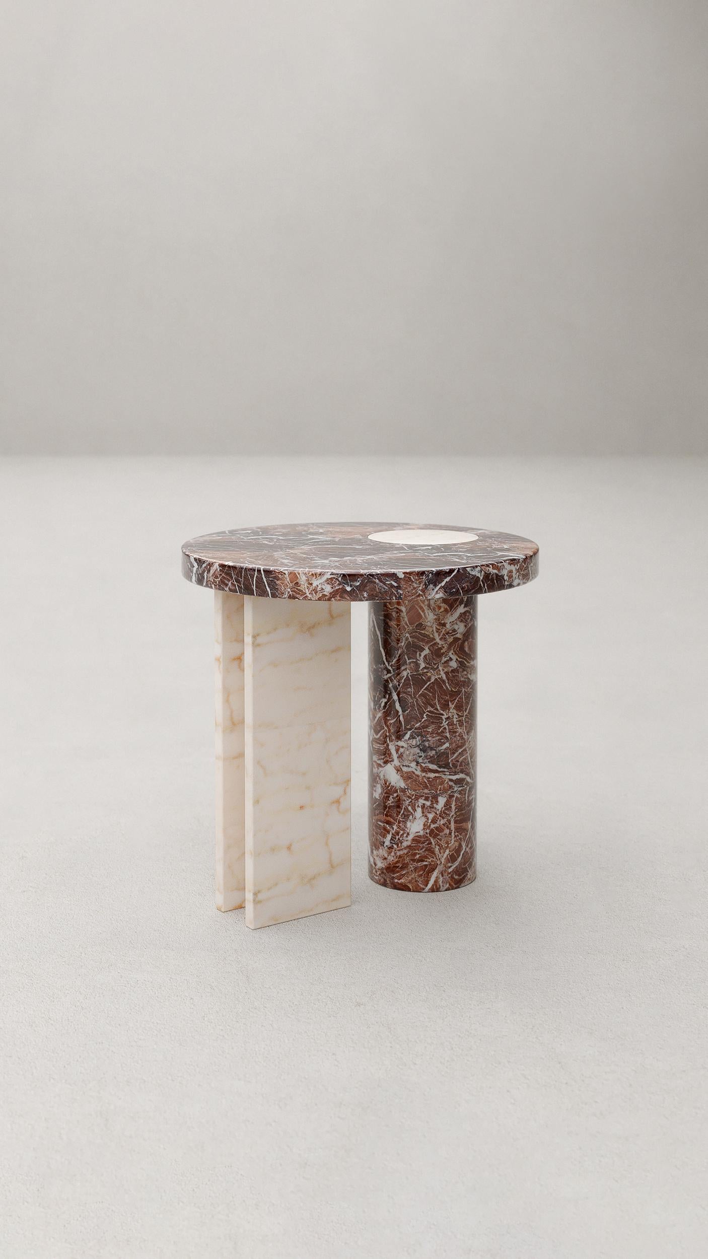 Salvante S1 side table by Piotr Dabrowa
Unique Piece
Dimensions: D 50 x H 50 cm
Materials: Rosa Portogallo marble, Rosa Peralba marble.
Also available in other marbles.

Salvante table collection is a play between shapes, materials & colours.