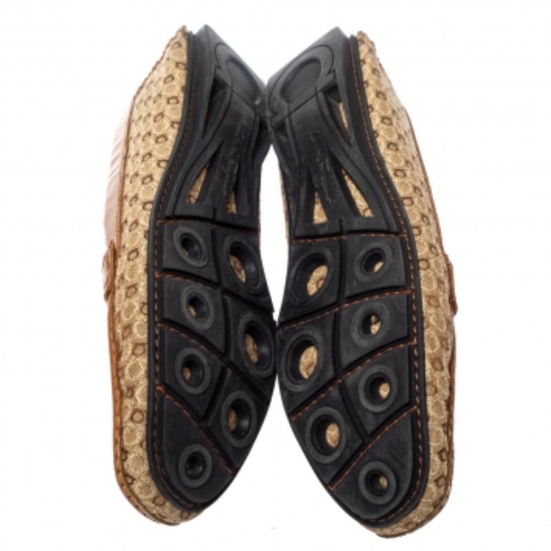 Opt for a sleek and neat finish with these loafers from Salvatore Ferragamo. Made from canvas and leather, the loafers feature logo detailing on the uppers and rubber soles for a durable finish. The insoles are lined with leather and carry the brand