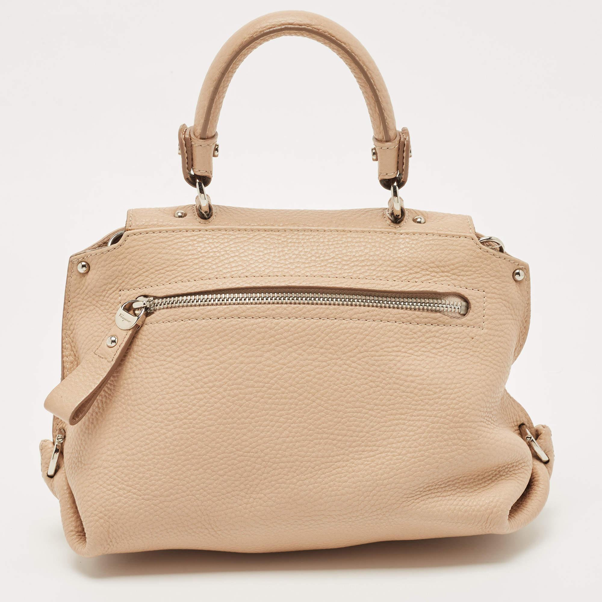 Designer bags are ideal companions for ample occasions! Here we have a fashion-meets-functionality piece crafted with precision. It has been equipped with a well-sized interior that can easily fit all your essentials.

Includes: Original Dustbag,