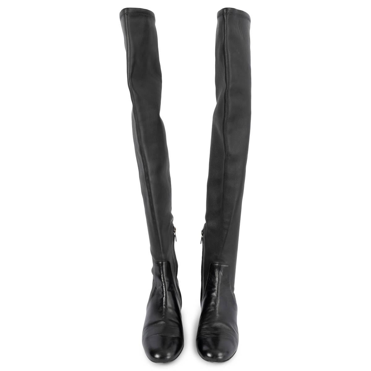100% authentic Salvatore Ferragamo over knee boots in black stretch nappa with hidden zipper and sculptural flower heel with galvanized metallic finish. Have been worn and are in excellent condition.

2017 Fall/Winter

Measurements
Imprinted