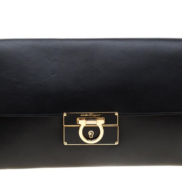 Salvatore Ferragamo Black Leather Afef Gancio Clutch For Sale at 1stdibs