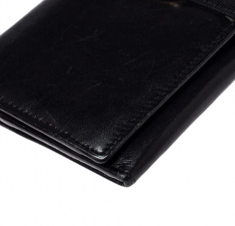 Women's Salvatore Ferragamo Black Leather Bow Wallet For Sale