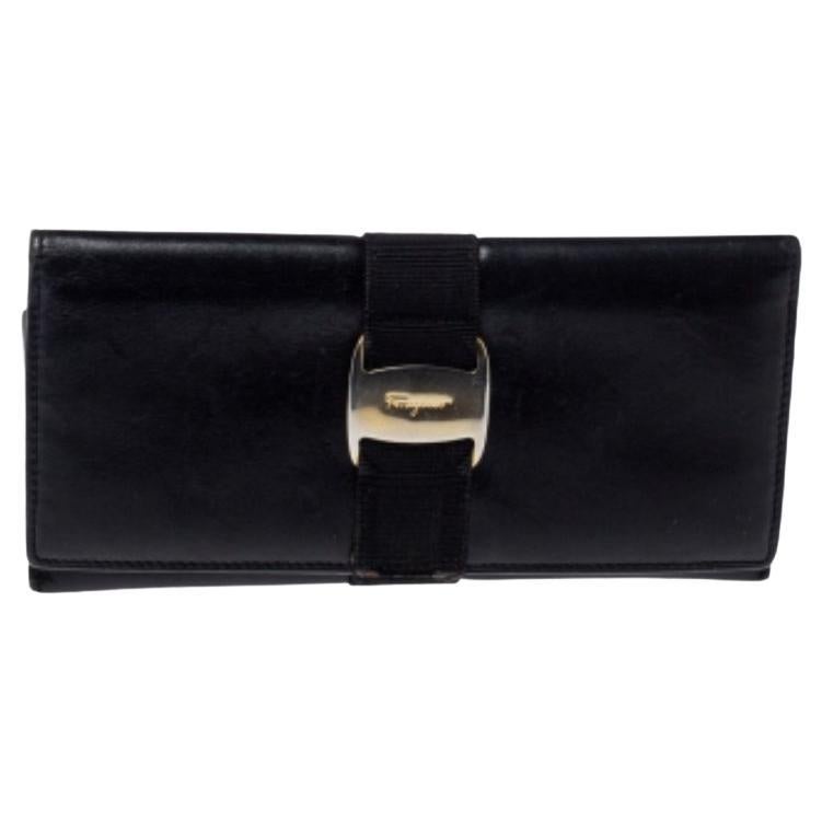 Salvatore Ferragamo Black Leather Bow Wallet For Sale