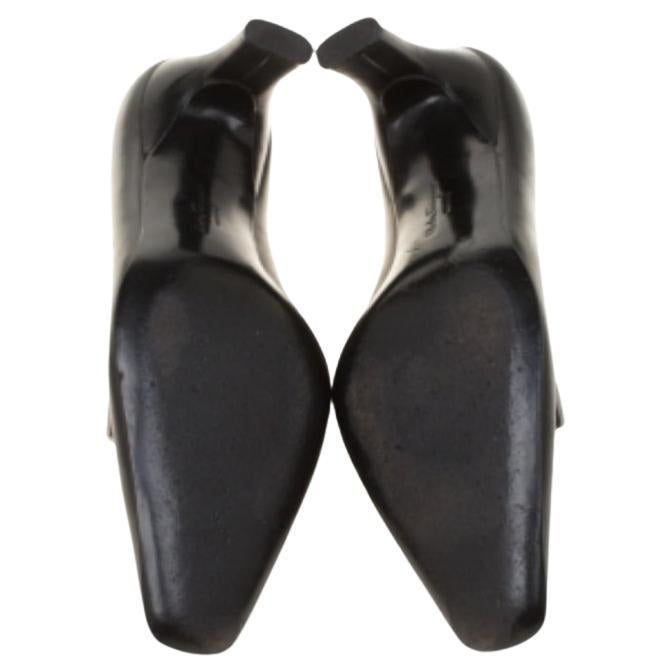 Match this pair of pumps from Salvatore Ferragamo with your favorite dress and grace any occasion. Flaunt the latest fashion as you waltz around in this pair of lovely leather footwear. These black beauties, ideal for all occasions, are a perfect