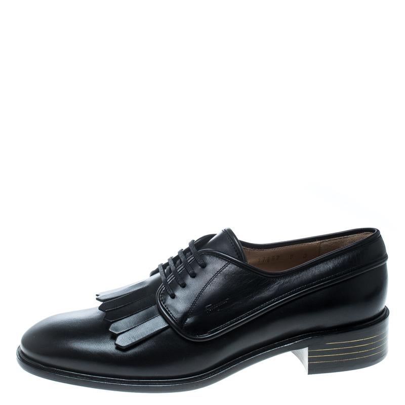 How chic, smart and stylish do these Faber Derby shoes from Salvatore Ferragamo look! The black pair is crafted from leather and features round toes, a fringe detailing and lace-ups on the vamps and comfortable insoles. The tough soles ensure