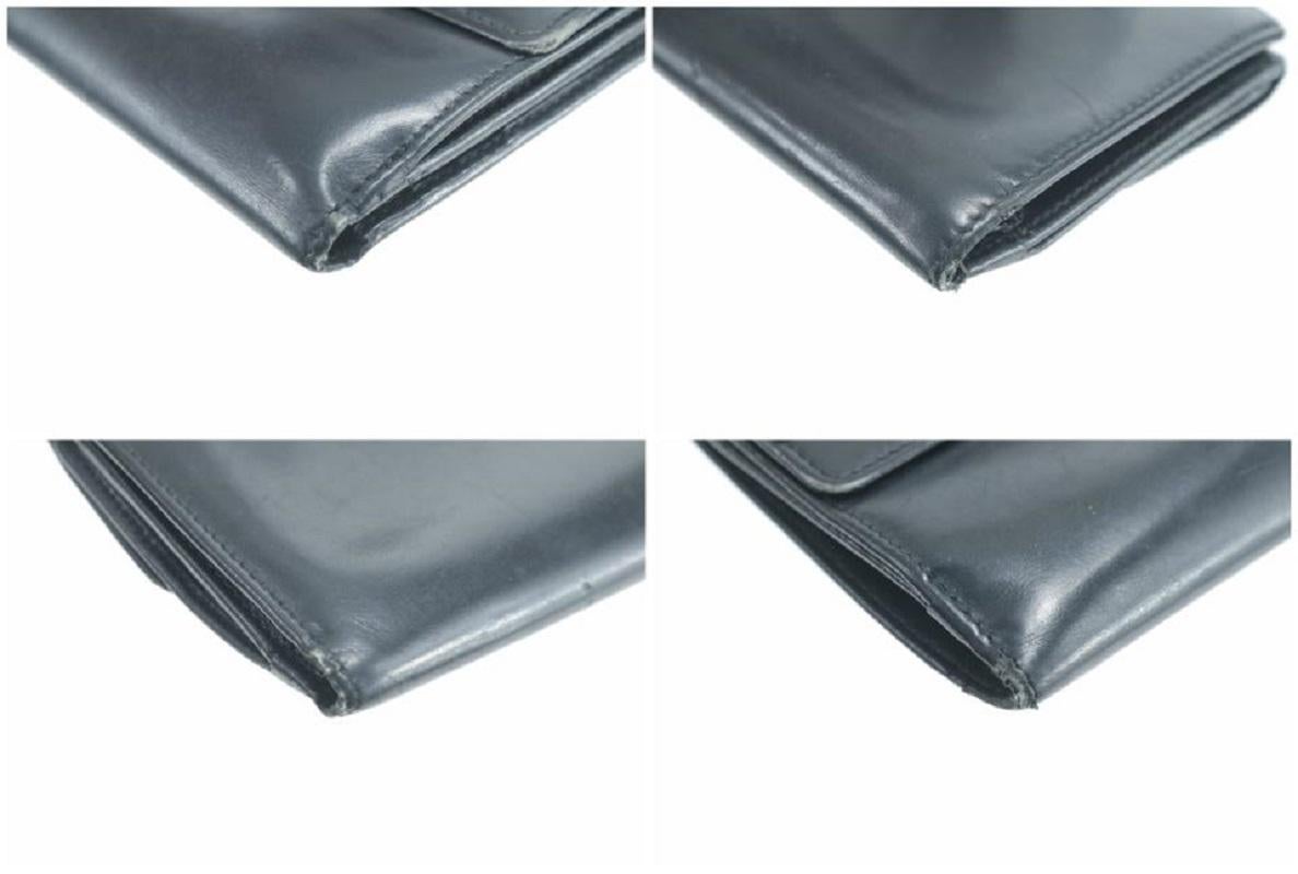 Salvatore Ferragamo Black Leather Gancini Logo Compact Wallet 16FK0113 For Sale 6