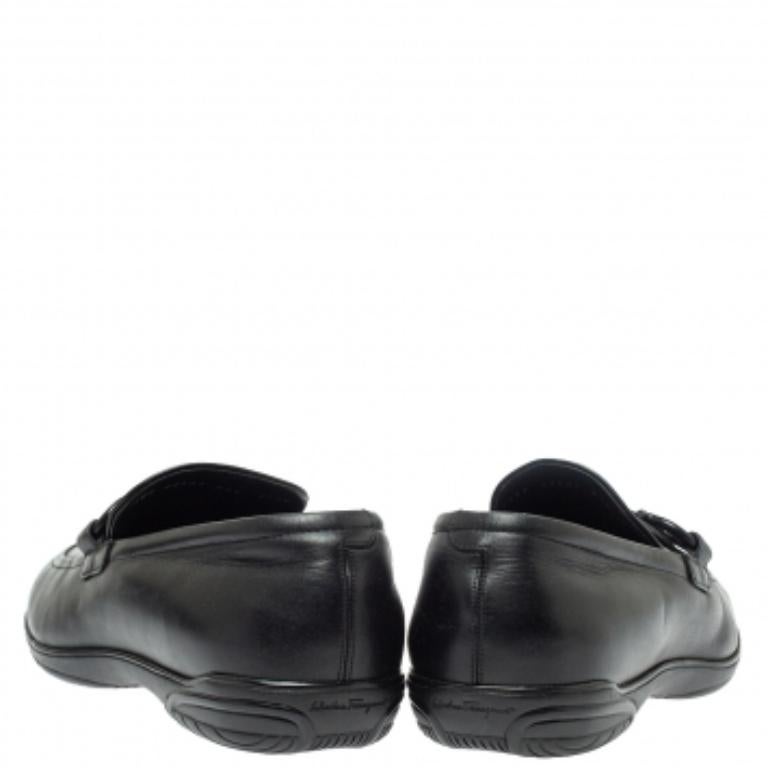 These Gancio loafers are one of Salvatore Ferragamo’s classic styles. This pair is crafted with luxurious black leather and feature a round toe design finished with the brand’s logo buckles. The insoles of these loafers are lined with leather
