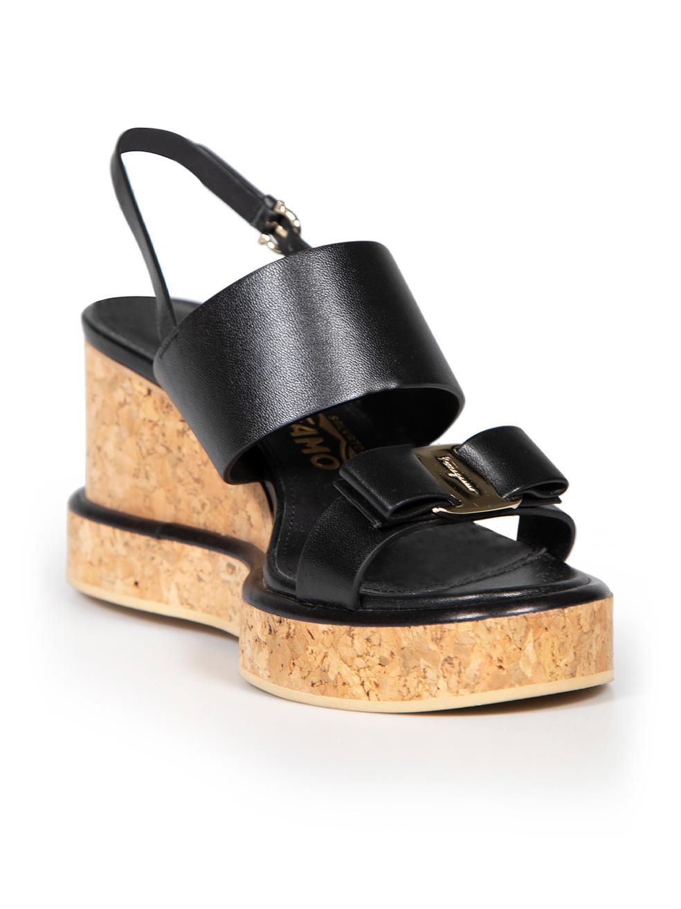 CONDITION is Never worn. No visible wear to shoes is evident on this new Salvatore Ferragamo designer resale item. These shoes come with original dust bag.
 
 
 
 Details
 
 
 Giudith model
 
 Black
 
 Leather
 
 Sandals
 
 Open toe
 
 Cork wedge