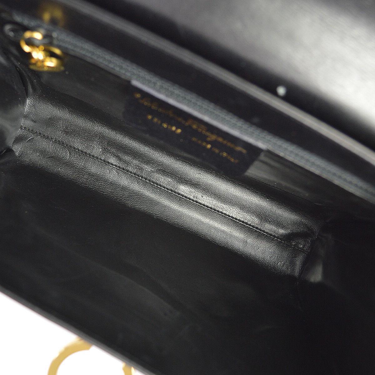 Salvatore Ferragamo Black Leather Gold 2 in 1 Clutch Shoulder Chain Flap Bag In Good Condition In Chicago, IL