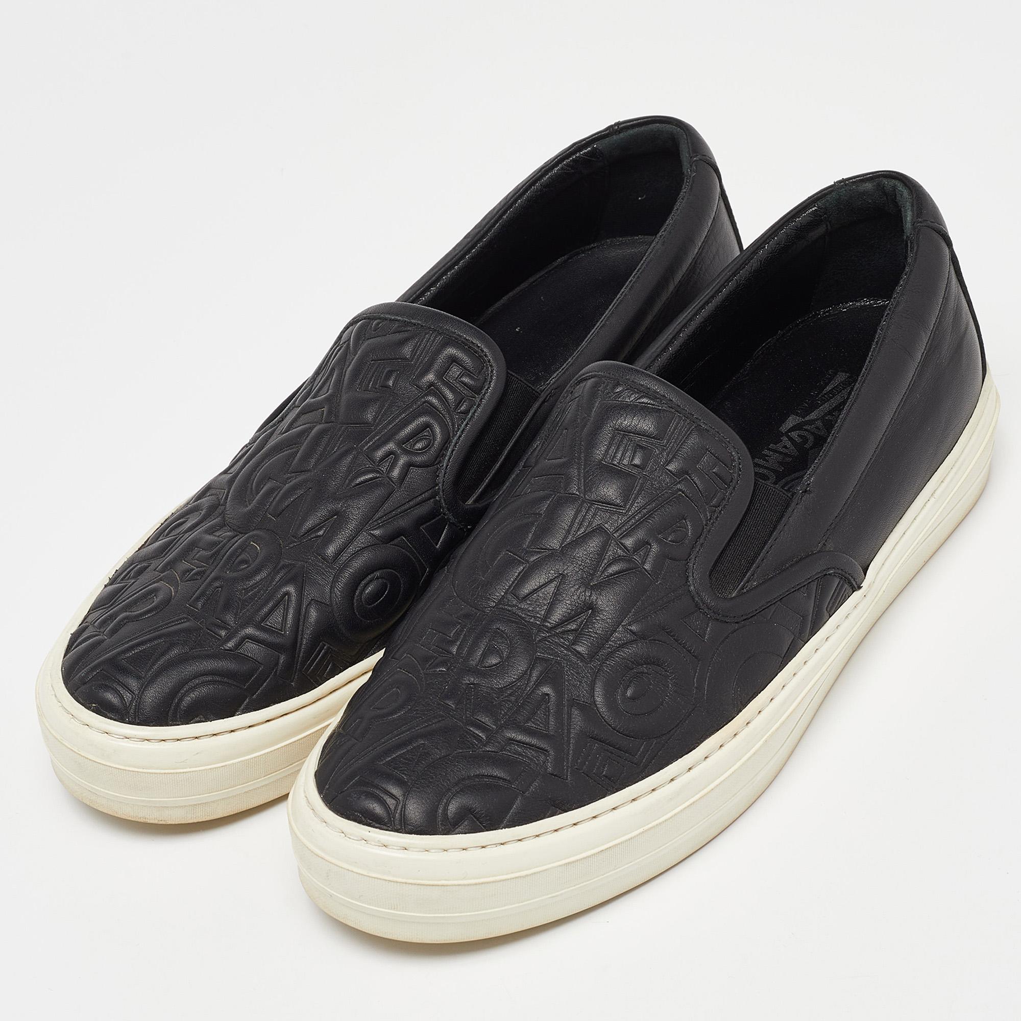 Flaunt your high style with these trendy sneakers from Salvatore Ferragamo! They've been carefully crafted from leather, and designed with logo embossing on the uppers. You are sure to receive both comfort and fashion when you choose this pair.