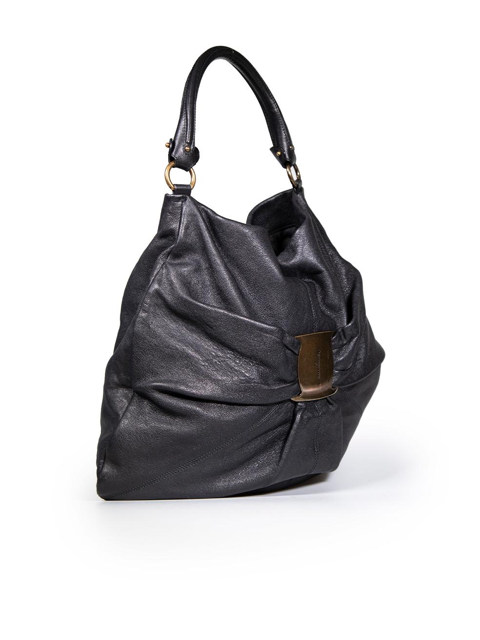 CONDITION is Very good. Minimal wear to bag is evident. Some small scratches to the base and abrasions to the base corners on this used Salvatore Ferragamo designer resale item.
 
 
 
 Details
 
 
 Model: Miss Vara
 
 Black
 
 Leather
 
 Large hobo