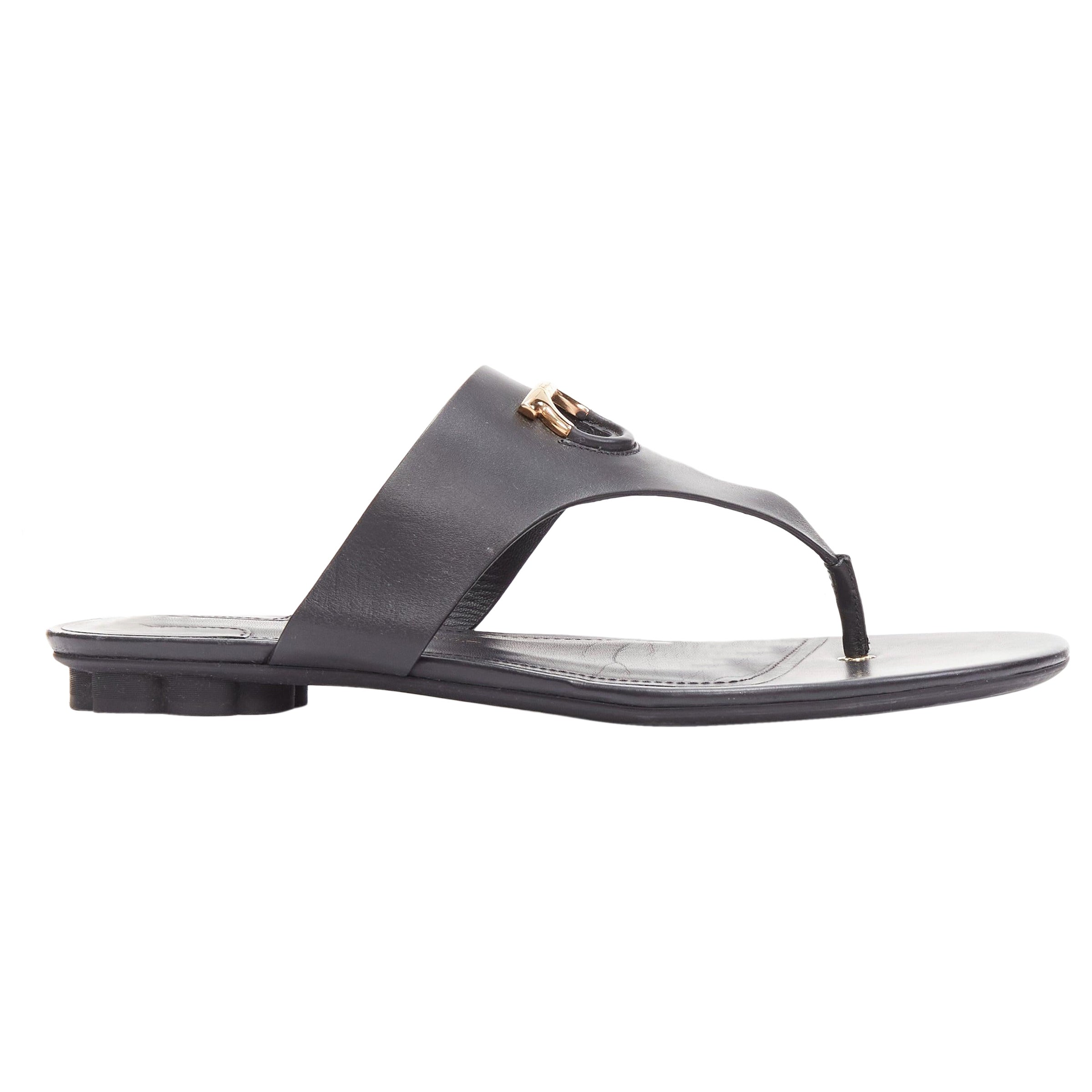 SALVATORE FERRAGAMO black leather rose gold logo ring thong sandals  EU37.5