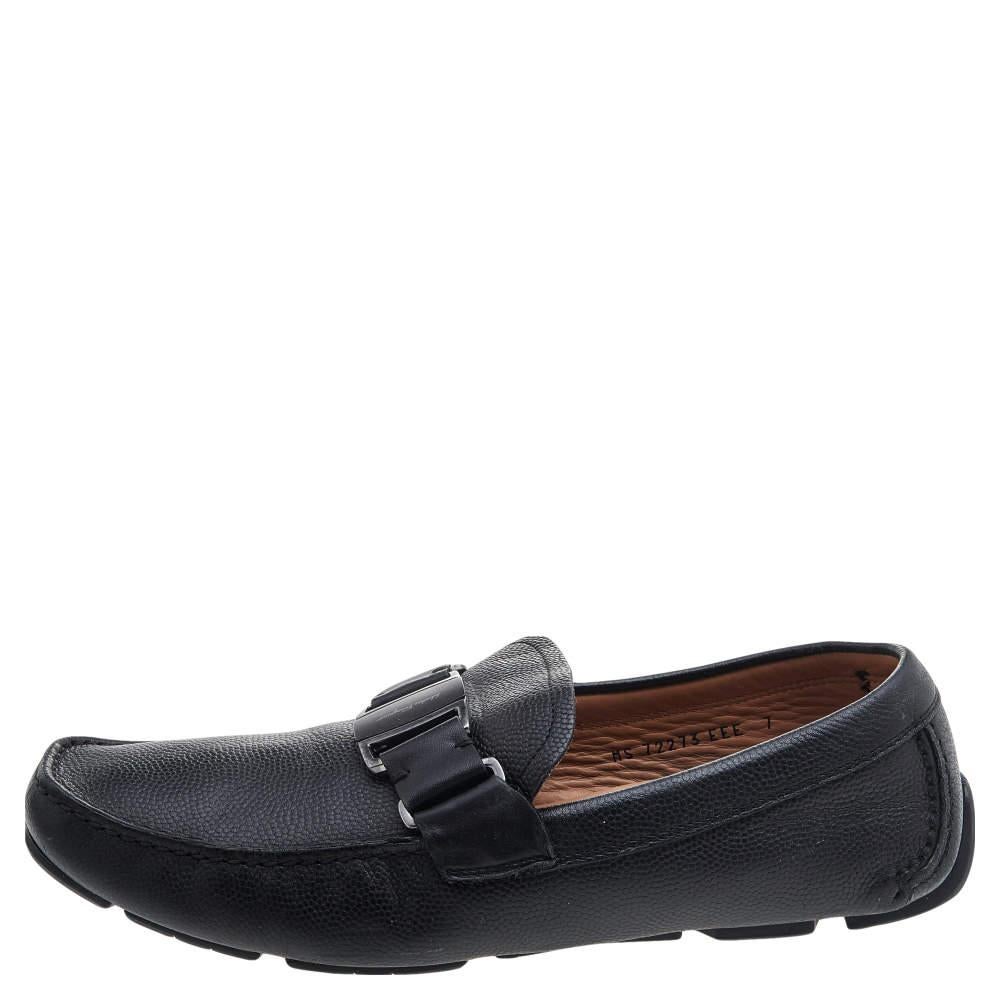 Let comfort and classic style be yours with these designer loafers from Salvatore Ferragamo. Crafted in leather, the high-quality shoes have the perfect construction to take you through the day with utmost ease.

