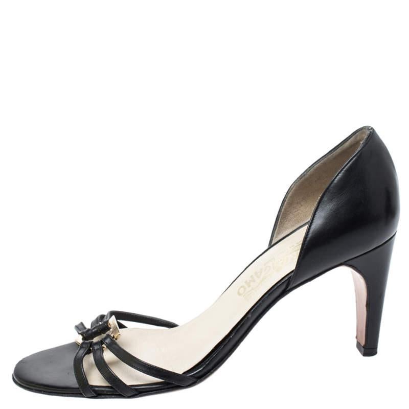 These sandals from Salvatore Ferragamo will lend an elegant edge to your feet. Look you best as you step out in these leather sandals. They feature the Gancini logo on the strappy uppers, covered counters and 7.5 cm heels.