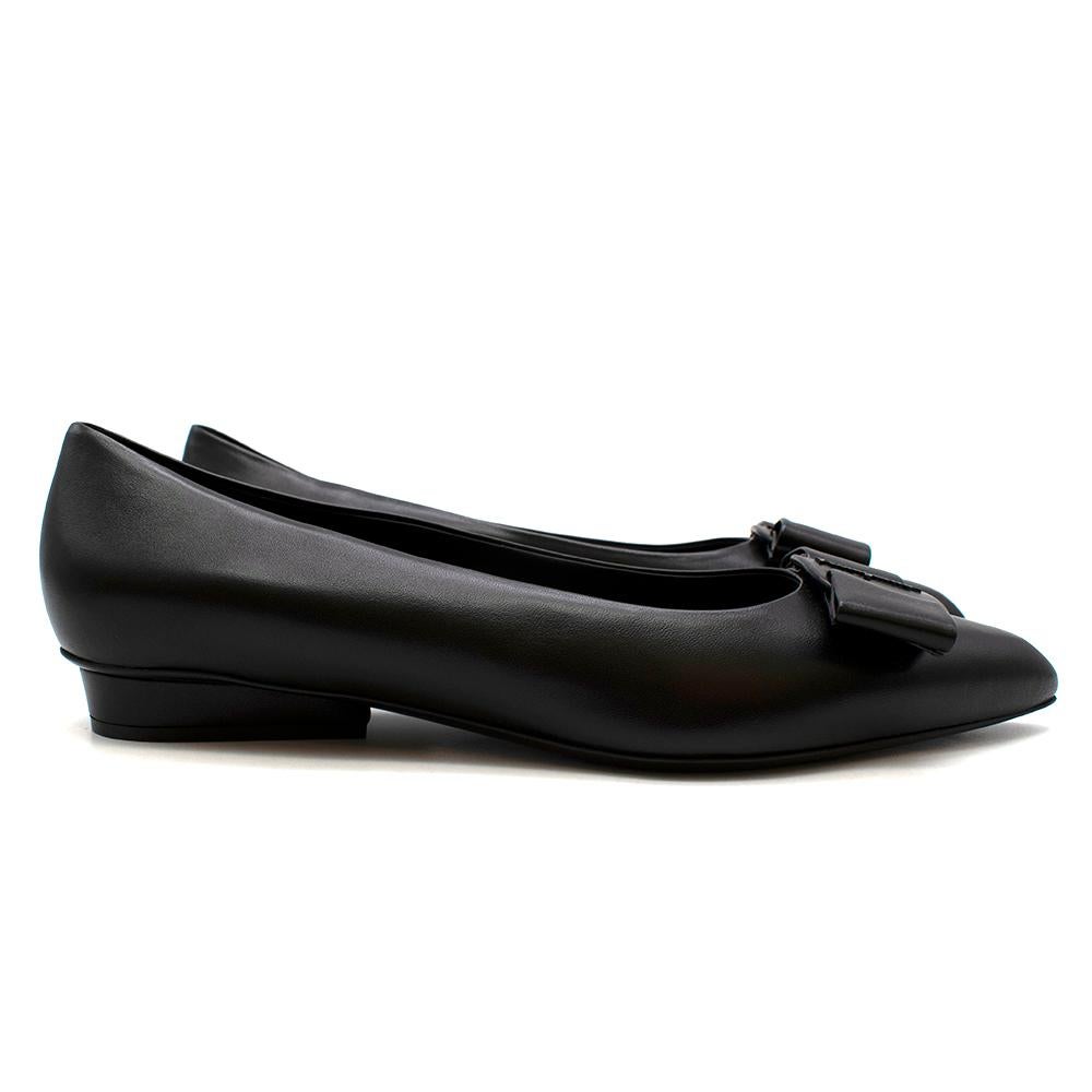 Salvatore Ferragamo Black Leather Viva Ballet Flats

Viva is the new Ferragamo ballet flat with a sophisticated and feminine design; a culmination of iconic elements of the brand with updated shapes. The slightly tapered neckline couples with the